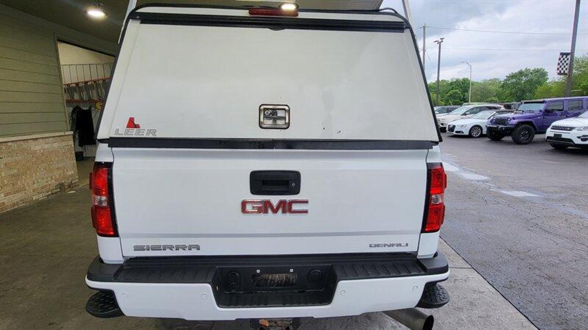 2015 Summit White GMC Sierra 2500 Denali (1GT120E83FF) with an Duramax 6.6L Diesel Turbo V8 397hp 765ft. lbs. engine, Automatic transmission, located at 25355 Eames Street, Channahon, IL, 60410, (815) 467-1807, 41.429108, -88.228432 - Oh honey, let me tell you about the 2015 GMC Sierra 2500 Denali. This baby is powered by a Duramax 6.6L Diesel Turbo V8 engine that's just begging to hit the open road. With 397 horsepower and a whopping 765ft. lbs. of torque, you'll be leaving all those slowpokes in the dust. But let's talk about - Photo#6