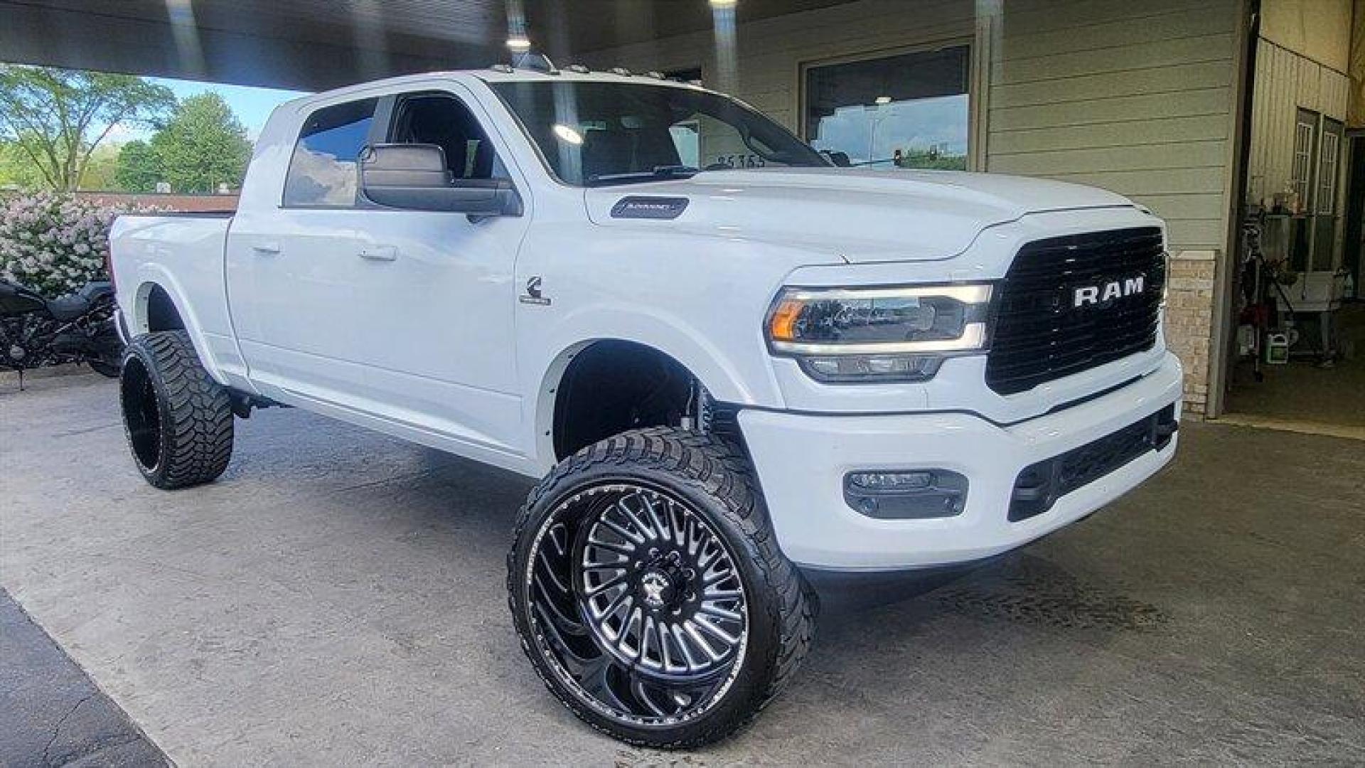 2019 Bright White Clear Coat RAM 2500 Laramie (3C6UR5NL2KG) with an Cummins 6.7L Diesel Turbo I6 370hp 850ft. lbs. engine, Automatic transmission, located at 25355 Eames Street, Channahon, IL, 60410, (815) 467-1807, 41.429108, -88.228432 - ** MEGA CAB, LIFTED, 26 IN WHEELS, TUNED and DELETED, WHEEL LIGHTS, STACK OUT THE BACK, THIS TRUCK WILL ROLL SOME COAL!!! ** Introducing the 2019 RAM 2500 Laramie, a powerhouse of a truck that boasts impressive capabilities and a sleek design. This particular model comes equipped with a Cummins - Photo#0