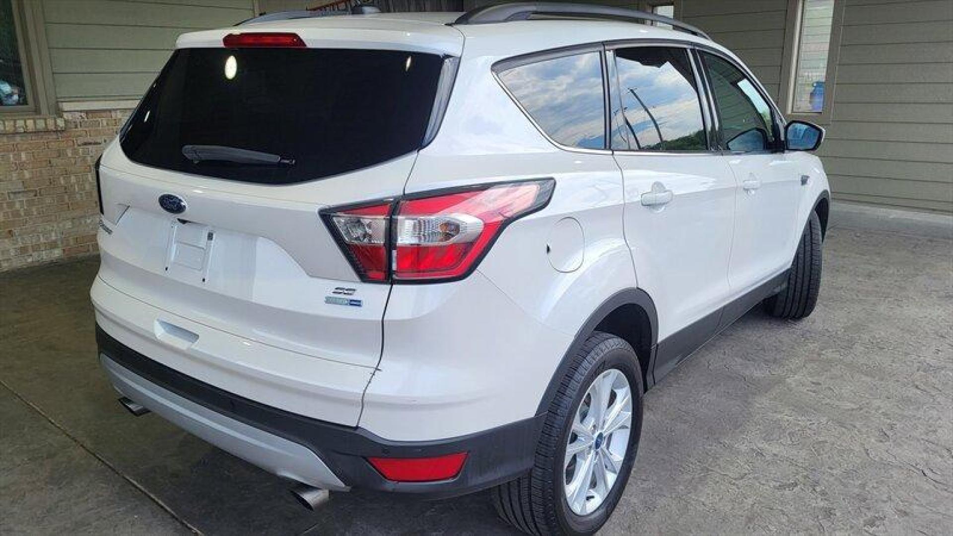 2017 Oxford White Ford Escape SE (1FMCU9G95HU) with an EcoBoost 2.0L Turbo I4 245hp 275ft. lbs. engine, Automatic transmission, located at 25355 Eames Street, Channahon, IL, 60410, (815) 467-1807, 41.429108, -88.228432 - Looking for a high-performing SUV that can handle anything life throws your way? Look no further than the 2017 Ford Escape SE! Powered by an impressive EcoBoost 2.0L Turbo I4 245hp 275ft. lbs. engine, this vehicle delivers a thrilling driving experience every time you hit the road. But that's not - Photo#3