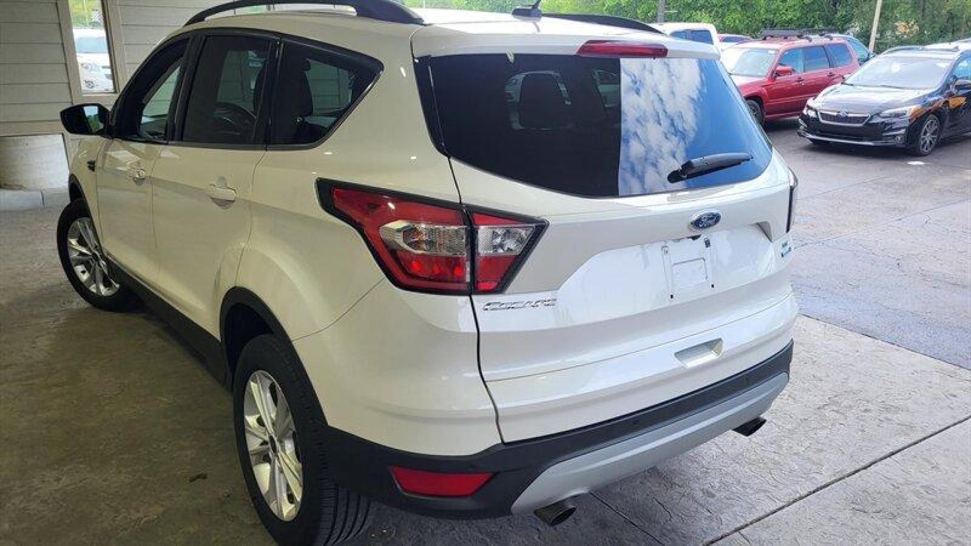 2017 Oxford White Ford Escape SE (1FMCU9G95HU) with an EcoBoost 2.0L Turbo I4 245hp 275ft. lbs. engine, Automatic transmission, located at 25355 Eames Street, Channahon, IL, 60410, (815) 467-1807, 41.429108, -88.228432 - Looking for a high-performing SUV that can handle anything life throws your way? Look no further than the 2017 Ford Escape SE! Powered by an impressive EcoBoost 2.0L Turbo I4 245hp 275ft. lbs. engine, this vehicle delivers a thrilling driving experience every time you hit the road. But that's not - Photo#5