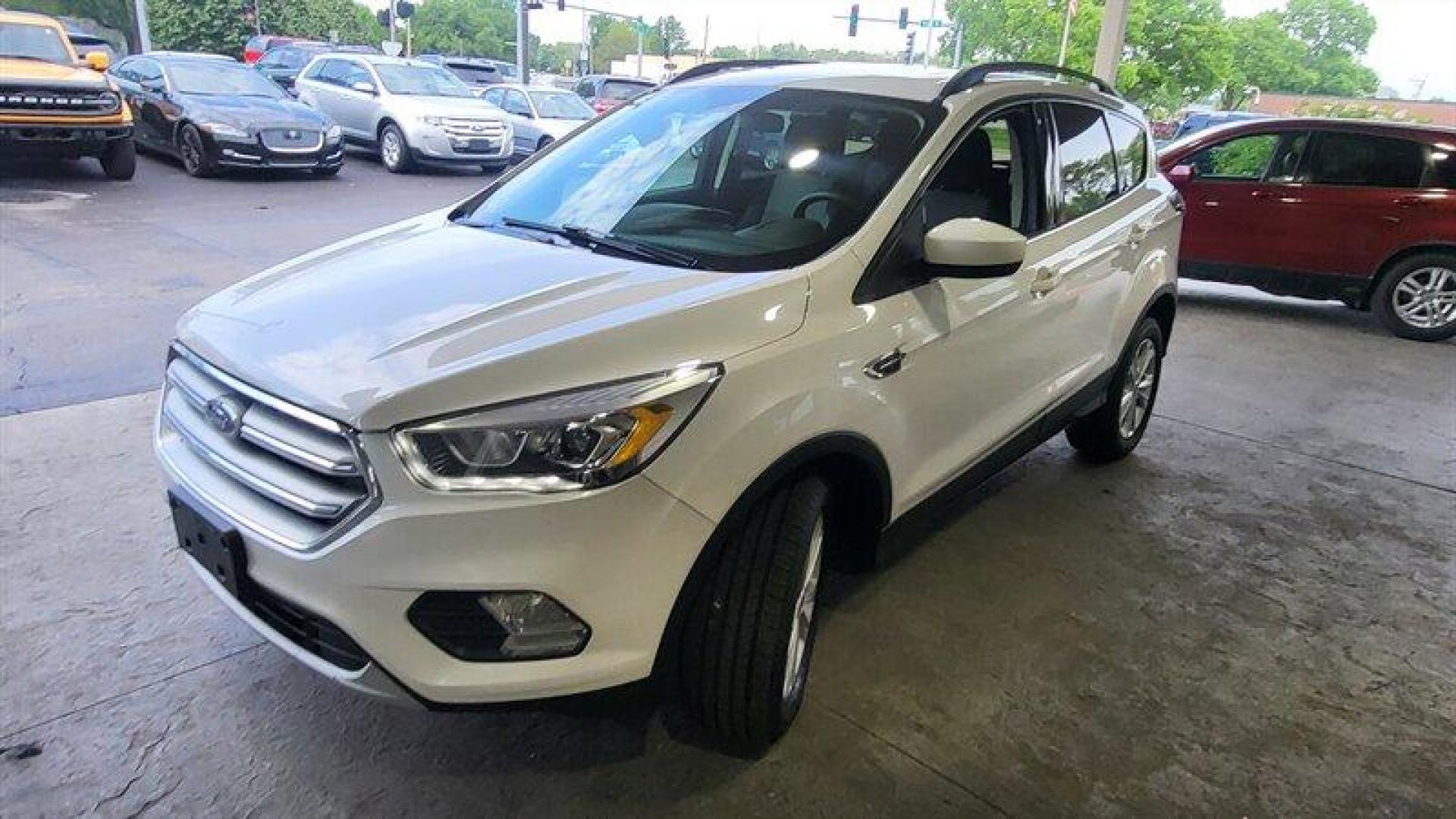 2017 Oxford White Ford Escape SE (1FMCU9G95HU) with an EcoBoost 2.0L Turbo I4 245hp 275ft. lbs. engine, Automatic transmission, located at 25355 Eames Street, Channahon, IL, 60410, (815) 467-1807, 41.429108, -88.228432 - Looking for a high-performing SUV that can handle anything life throws your way? Look no further than the 2017 Ford Escape SE! Powered by an impressive EcoBoost 2.0L Turbo I4 245hp 275ft. lbs. engine, this vehicle delivers a thrilling driving experience every time you hit the road. But that's not - Photo#7