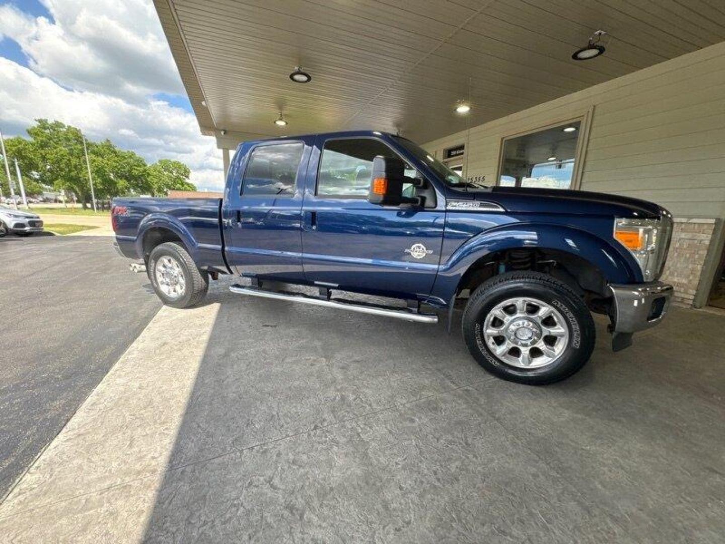 2012 Dark Blue Pearl Metallic Ford F-250 Lariat (1FT7W2BT9CE) with an Power Stroke 6.7L Biodiesel Turbo V8 400hp 800ft. engine, Automatic transmission, located at 25355 Eames Street, Channahon, IL, 60410, (815) 467-1807, 41.429108, -88.228432 - Photo#1