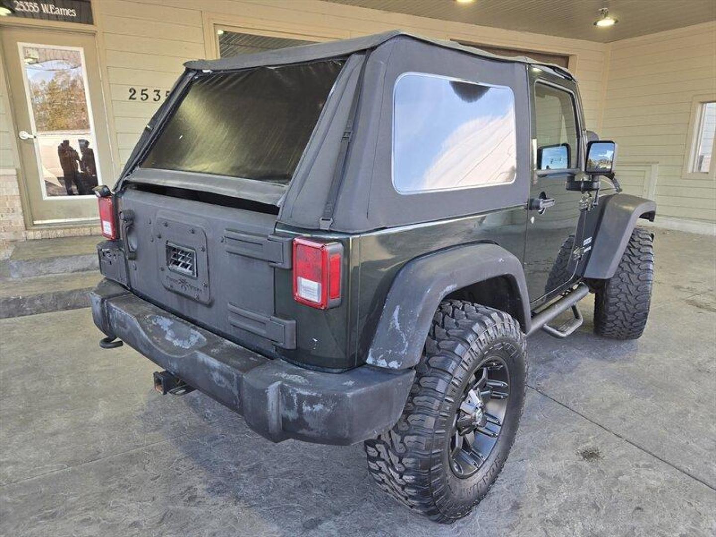 2011 Natural Green Pearl Coat Jeep Wrangler Sport (1J4AA2D15BL) with an 3.8L V6 202hp 237ft. lbs. engine, 6 Speed Manual transmission, located at 25355 Eames Street, Channahon, IL, 60410, (815) 467-1807, 41.429108, -88.228432 - *ART ON HOOD IS PAINTED NOT A WRAP* Ladies and gentlemen, feast your eyes on the ultimate adventurer's dream machine - the 2011 Jeep Wrangler Sport! This bad boy is powered by a 3.8L V6 engine that pumps out an impressive 202 horses and 237 lb-ft of torque. That means you'll be able to climb over m - Photo#3