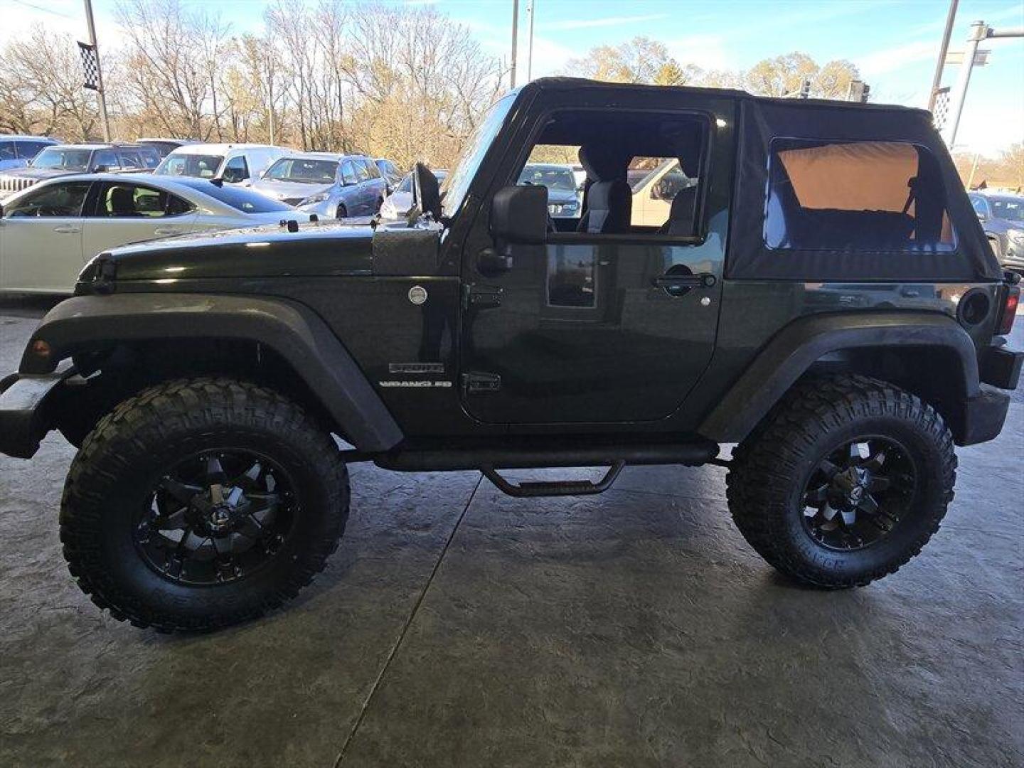 2011 Natural Green Pearl Coat Jeep Wrangler Sport (1J4AA2D15BL) with an 3.8L V6 202hp 237ft. lbs. engine, 6 Speed Manual transmission, located at 25355 Eames Street, Channahon, IL, 60410, (815) 467-1807, 41.429108, -88.228432 - *ART ON HOOD IS PAINTED NOT A WRAP* Ladies and gentlemen, feast your eyes on the ultimate adventurer's dream machine - the 2011 Jeep Wrangler Sport! This bad boy is powered by a 3.8L V6 engine that pumps out an impressive 202 horses and 237 lb-ft of torque. That means you'll be able to climb over m - Photo#7