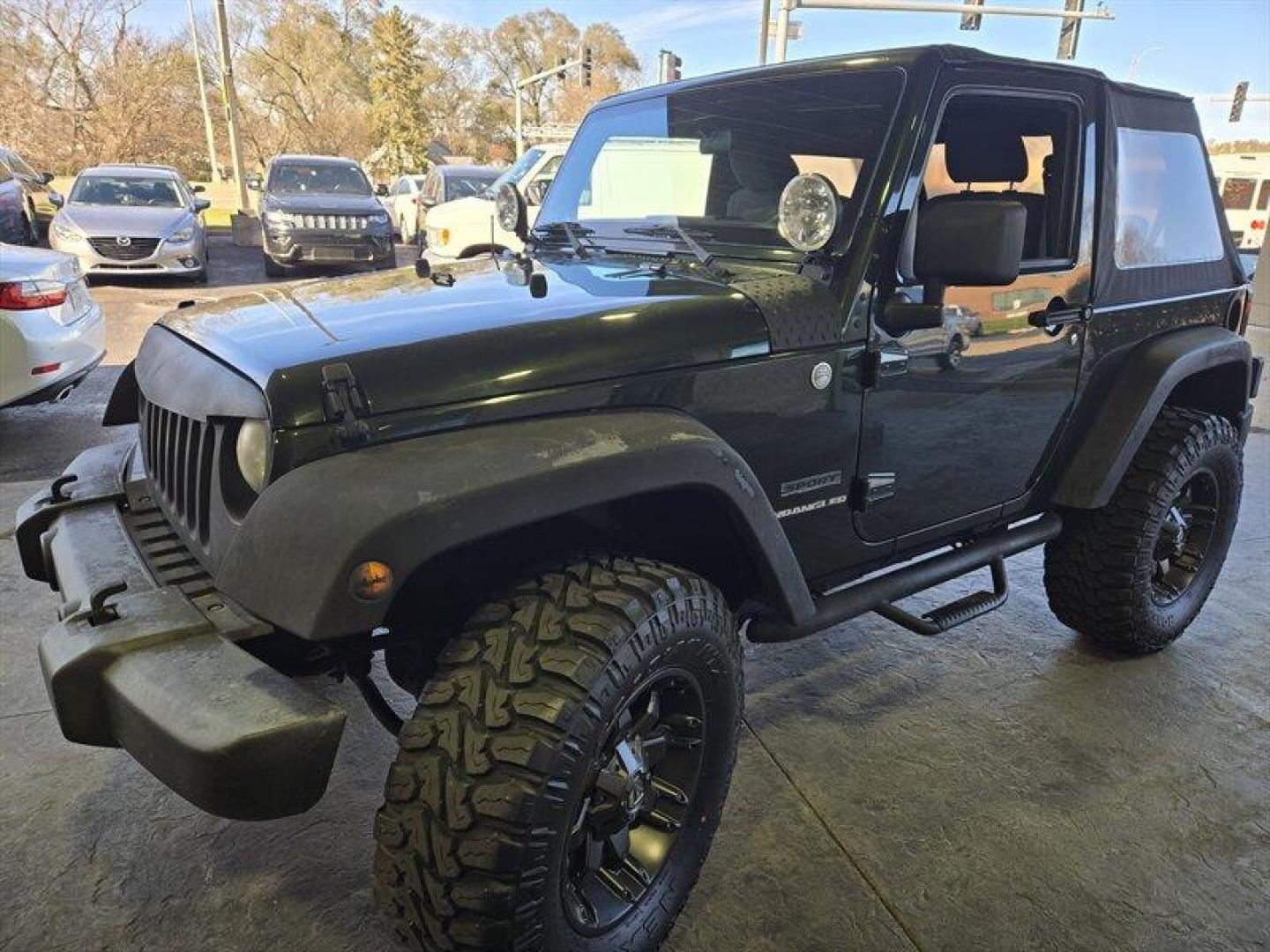 2011 Natural Green Pearl Coat Jeep Wrangler Sport (1J4AA2D15BL) with an 3.8L V6 202hp 237ft. lbs. engine, 6 Speed Manual transmission, located at 25355 Eames Street, Channahon, IL, 60410, (815) 467-1807, 41.429108, -88.228432 - *ART ON HOOD IS PAINTED NOT A WRAP* Ladies and gentlemen, feast your eyes on the ultimate adventurer's dream machine - the 2011 Jeep Wrangler Sport! This bad boy is powered by a 3.8L V6 engine that pumps out an impressive 202 horses and 237 lb-ft of torque. That means you'll be able to climb over m - Photo#8