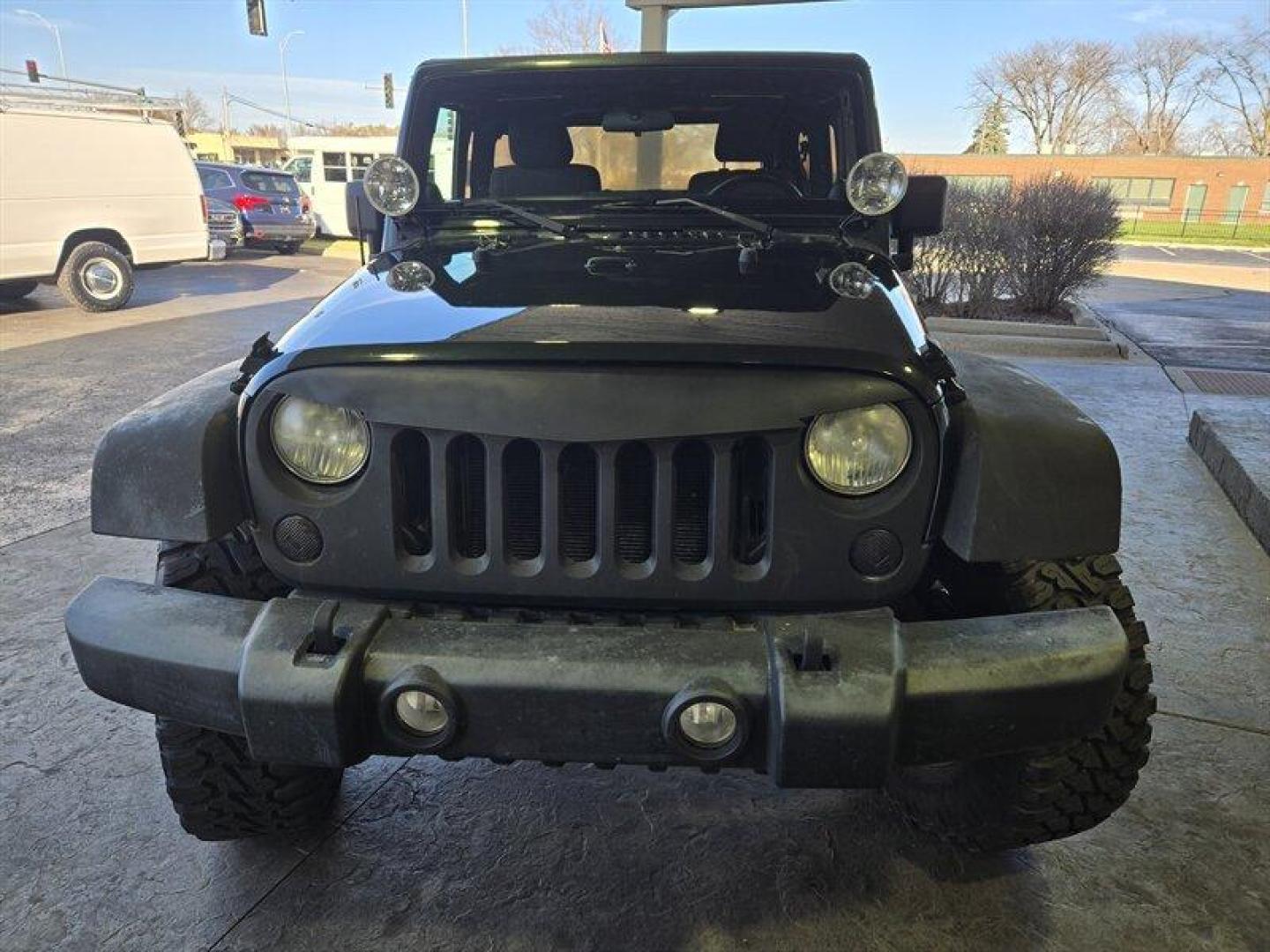 2011 Natural Green Pearl Coat Jeep Wrangler Sport (1J4AA2D15BL) with an 3.8L V6 202hp 237ft. lbs. engine, 6 Speed Manual transmission, located at 25355 Eames Street, Channahon, IL, 60410, (815) 467-1807, 41.429108, -88.228432 - *ART ON HOOD IS PAINTED NOT A WRAP* Ladies and gentlemen, feast your eyes on the ultimate adventurer's dream machine - the 2011 Jeep Wrangler Sport! This bad boy is powered by a 3.8L V6 engine that pumps out an impressive 202 horses and 237 lb-ft of torque. That means you'll be able to climb over m - Photo#9