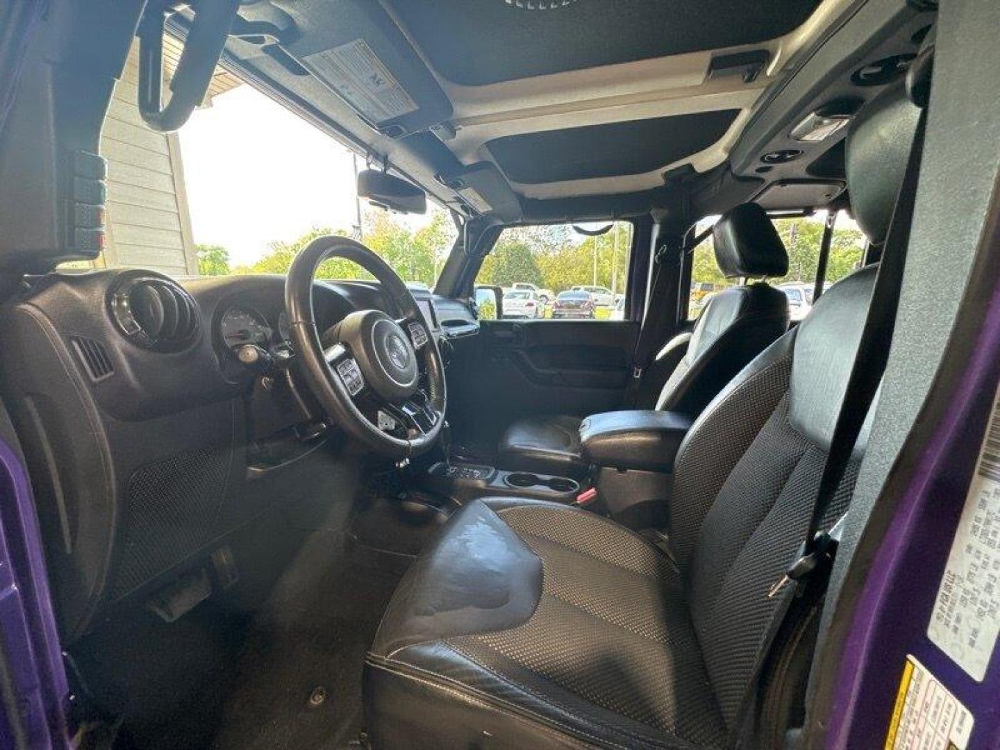 2016 Purple Jeep Wrangler Unlimited Sahara (1C4BJWEG3GL) with an 3.6L V6 285hp 260ft. lbs. engine, Automatic transmission, located at 25355 Eames Street, Channahon, IL, 60410, (815) 467-1807, 41.429108, -88.228432 - Looking for a vehicle that's as tough as it is stylish? Look no further than the 2016 Jeep Wrangler Unlimited Sahara Back Country! This rugged SUV is powered by a powerful 3.6L V6 engine that delivers an impressive 285hp and 260ft. lbs. of torque, giving you the power you need to tackle any terrain. - Photo#13