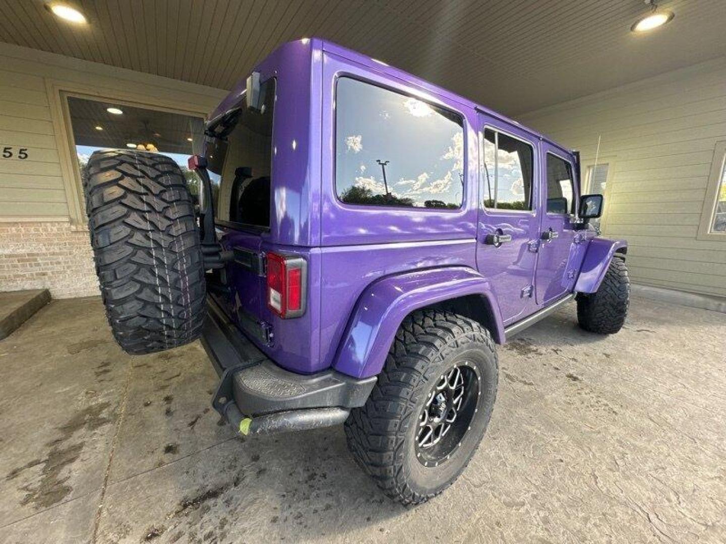 2016 Purple Jeep Wrangler Unlimited Sahara (1C4BJWEG3GL) with an 3.6L V6 285hp 260ft. lbs. engine, Automatic transmission, located at 25355 Eames Street, Channahon, IL, 60410, (815) 467-1807, 41.429108, -88.228432 - Looking for a vehicle that's as tough as it is stylish? Look no further than the 2016 Jeep Wrangler Unlimited Sahara Back Country! This rugged SUV is powered by a powerful 3.6L V6 engine that delivers an impressive 285hp and 260ft. lbs. of torque, giving you the power you need to tackle any terrain. - Photo#3