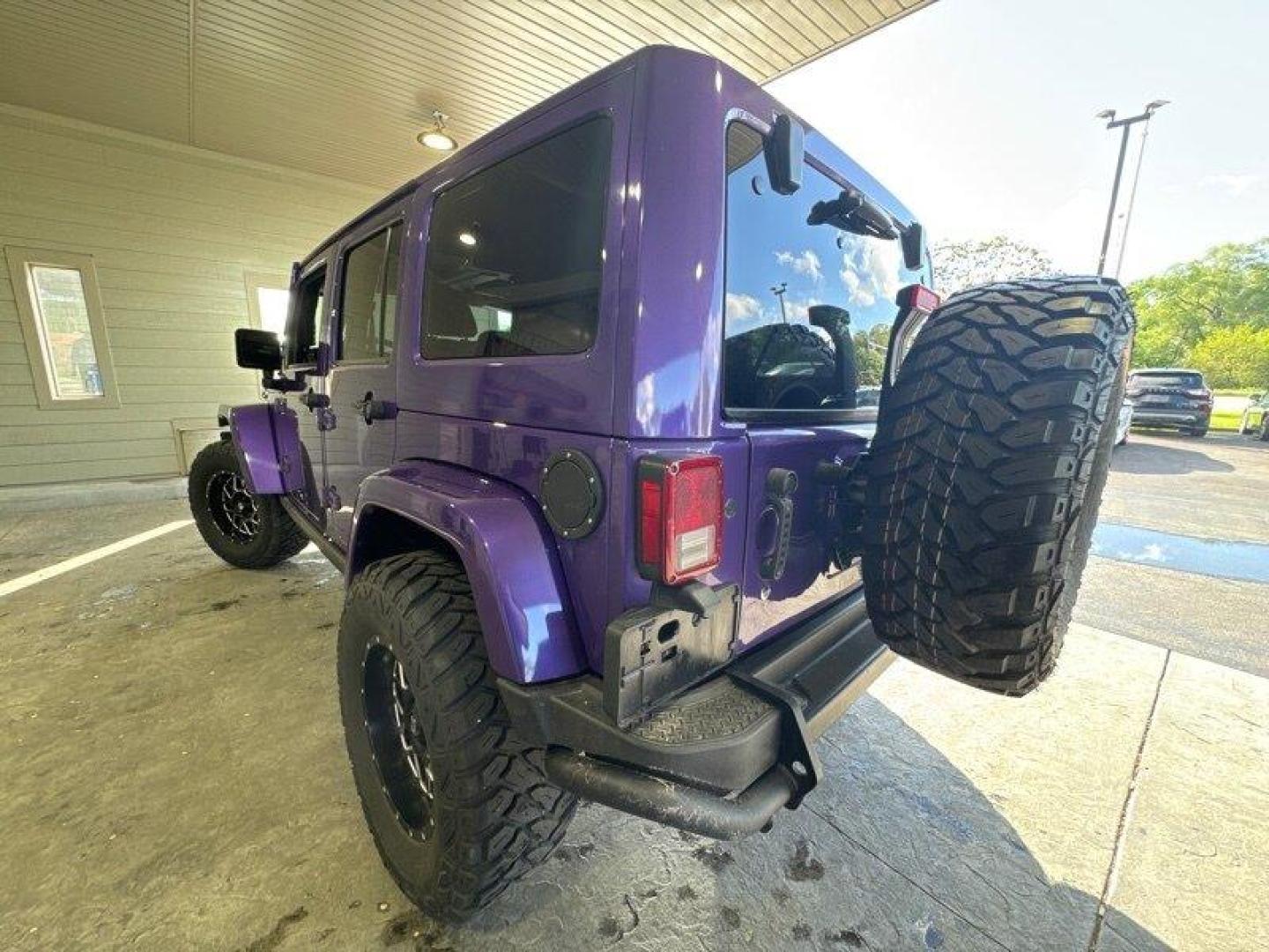 2016 Purple Jeep Wrangler Unlimited Sahara (1C4BJWEG3GL) with an 3.6L V6 285hp 260ft. lbs. engine, Automatic transmission, located at 25355 Eames Street, Channahon, IL, 60410, (815) 467-1807, 41.429108, -88.228432 - Looking for a vehicle that's as tough as it is stylish? Look no further than the 2016 Jeep Wrangler Unlimited Sahara Back Country! This rugged SUV is powered by a powerful 3.6L V6 engine that delivers an impressive 285hp and 260ft. lbs. of torque, giving you the power you need to tackle any terrain. - Photo#5