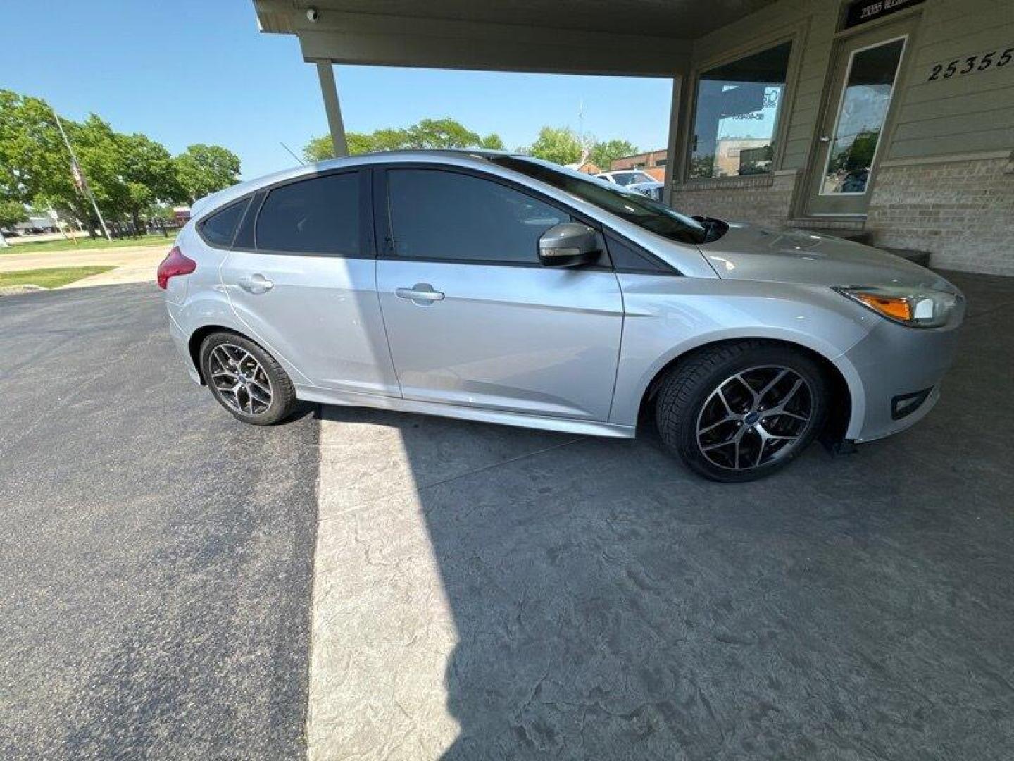 2015 Ingot Silver Ford Focus SE (1FADP3K20FL) with an 2.0L Flex Fuel I4 160hp 146ft. lbs. engine, Automatic transmission, located at 25355 Eames Street, Channahon, IL, 60410, (815) 467-1807, 41.429108, -88.228432 - Looking for a car that's powerful, stylish, and packed with features? Look no further than the 2015 Ford Focus SE! With a 2.0L Flex Fuel I4 engine that produces a whopping 160 horsepower and 146 foot-pounds of torque, this car is a true powerhouse on the road. And with an exterior that's finished in - Photo#1