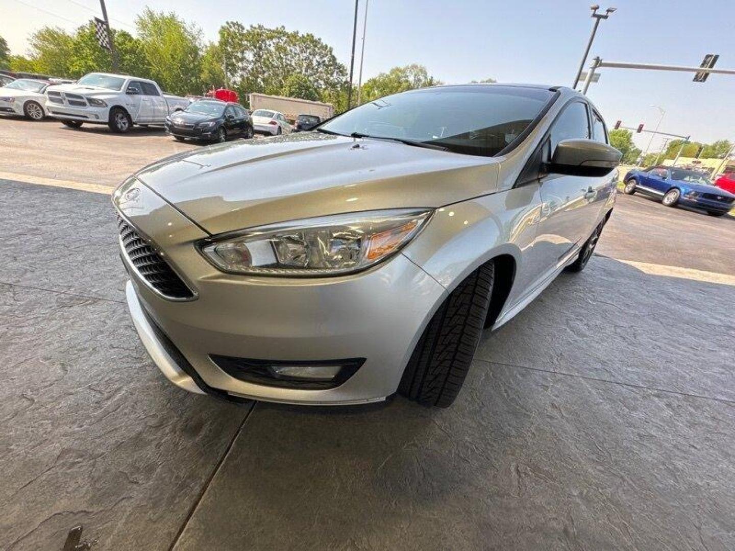 2015 Ingot Silver Ford Focus SE (1FADP3K20FL) with an 2.0L Flex Fuel I4 160hp 146ft. lbs. engine, Automatic transmission, located at 25355 Eames Street, Channahon, IL, 60410, (815) 467-1807, 41.429108, -88.228432 - Looking for a car that's powerful, stylish, and packed with features? Look no further than the 2015 Ford Focus SE! With a 2.0L Flex Fuel I4 engine that produces a whopping 160 horsepower and 146 foot-pounds of torque, this car is a true powerhouse on the road. And with an exterior that's finished in - Photo#7