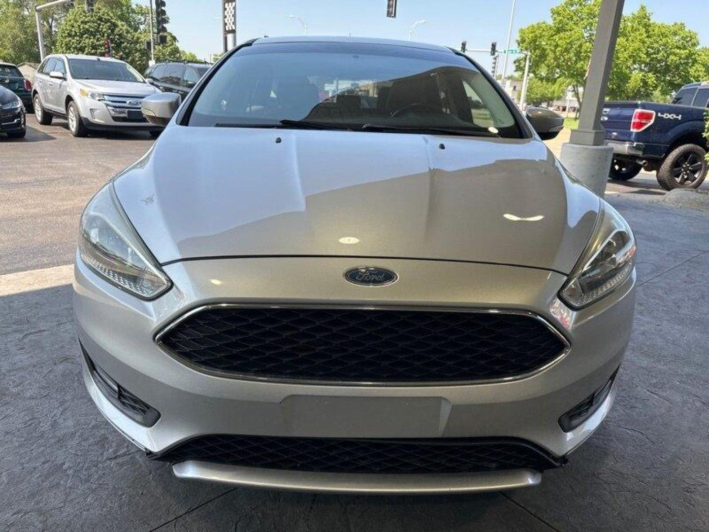 2015 Ingot Silver Ford Focus SE (1FADP3K20FL) with an 2.0L Flex Fuel I4 160hp 146ft. lbs. engine, Automatic transmission, located at 25355 Eames Street, Channahon, IL, 60410, (815) 467-1807, 41.429108, -88.228432 - Looking for a car that's powerful, stylish, and packed with features? Look no further than the 2015 Ford Focus SE! With a 2.0L Flex Fuel I4 engine that produces a whopping 160 horsepower and 146 foot-pounds of torque, this car is a true powerhouse on the road. And with an exterior that's finished in - Photo#8