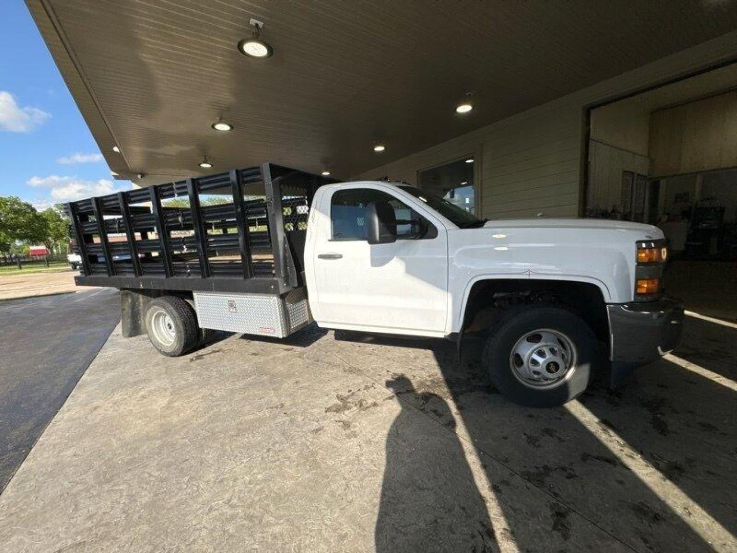 2015 White Chevrolet Silverado 3500HD CC Work Truck (1GB3CYCG4FF) with an 6.0L V8 322hp 380ft. lbs. engine, Automatic transmission, located at 25355 Eames Street, Channahon, IL, 60410, (815) 467-1807, 41.429108, -88.228432 - **11 FOOT MONROE STAKE BODY WITH SIDES** Introducing a sturdy and reliable pickup truck, the 2015 Chevrolet Silverado 3500HD CC Work Truck. This vehicle is equipped with a powerful 6.0L V8 engine that produces 322 horsepower and 380 foot-pounds of torque, making it a great choice for hauling heavy - Photo#1