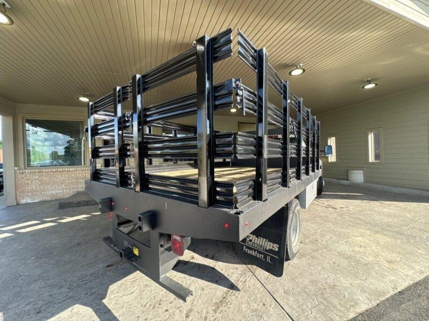 2015 White Chevrolet Silverado 3500HD CC Work Truck (1GB3CYCG4FF) with an 6.0L V8 322hp 380ft. lbs. engine, Automatic transmission, located at 25355 Eames Street, Channahon, IL, 60410, (815) 467-1807, 41.429108, -88.228432 - **11 FOOT MONROE STAKE BODY WITH SIDES** Introducing a sturdy and reliable pickup truck, the 2015 Chevrolet Silverado 3500HD CC Work Truck. This vehicle is equipped with a powerful 6.0L V8 engine that produces 322 horsepower and 380 foot-pounds of torque, making it a great choice for hauling heavy - Photo#2