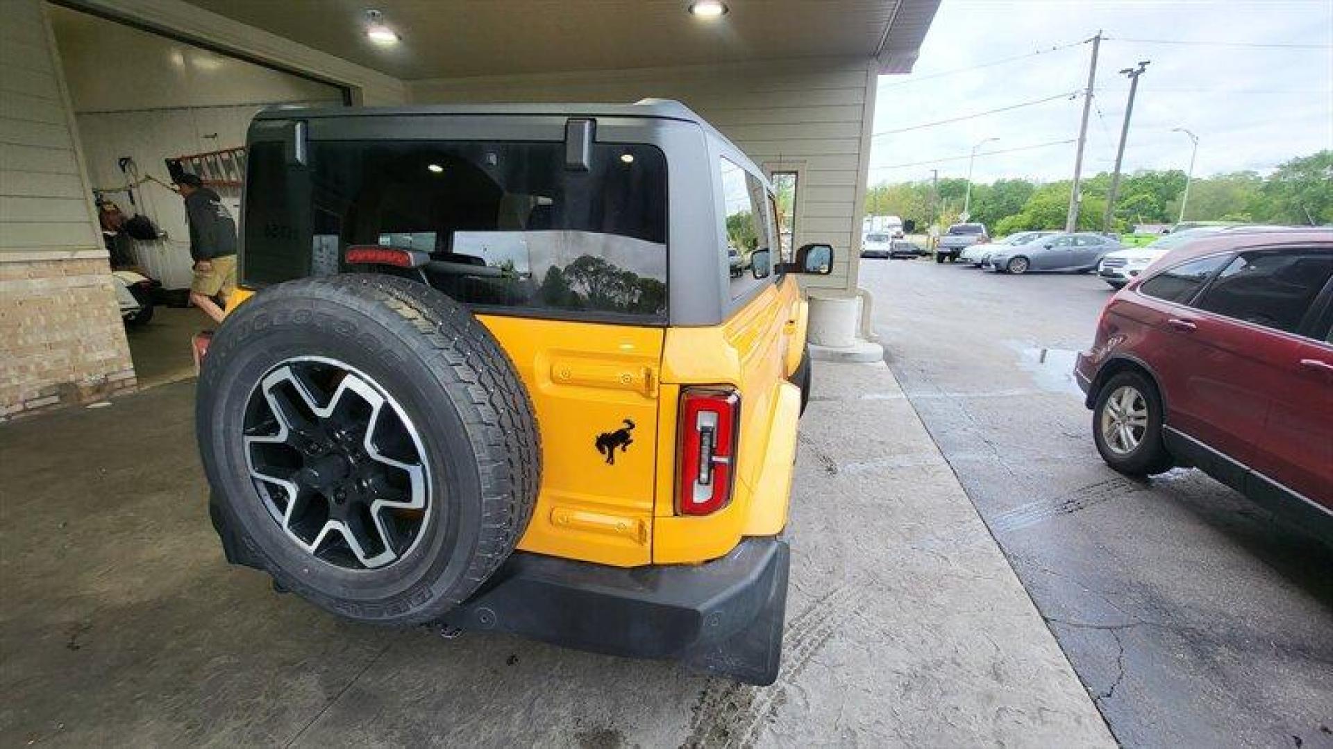 2021 Cyber Orange Metallic Tri-Coat Ford Bronco Outer Banks (1FMDE5CH5ML) with an EcoBoost 2.3L Turbo I4 275hp 315ft. lbs. engine, Automatic transmission, located at 25355 Eames Street, Channahon, IL, 60410, (815) 467-1807, 41.429108, -88.228432 - Introducing the 2021 Ford Bronco Advanced, a powerful and stylish SUV that is sure to impress. Equipped with a fuel-efficient EcoBoost 2.3L Turbo I4 engine producing 275 horsepower and 315 ft. lbs of torque, this vehicle offers a smooth and responsive driving experience. The Cyber Orange Metallic - Photo#4