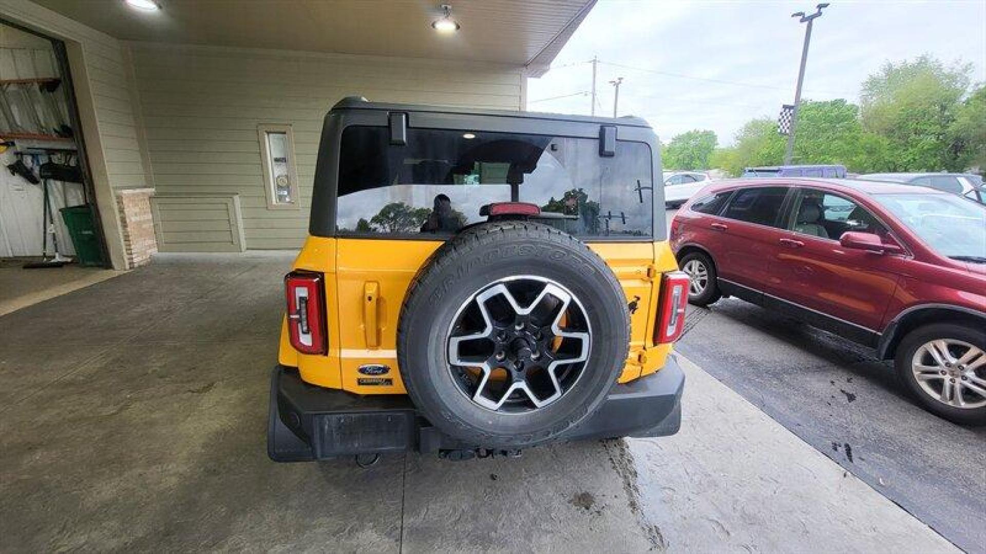 2021 Cyber Orange Metallic Tri-Coat Ford Bronco Outer Banks (1FMDE5CH5ML) with an EcoBoost 2.3L Turbo I4 275hp 315ft. lbs. engine, Automatic transmission, located at 25355 Eames Street, Channahon, IL, 60410, (815) 467-1807, 41.429108, -88.228432 - Introducing the 2021 Ford Bronco Advanced, a powerful and stylish SUV that is sure to impress. Equipped with a fuel-efficient EcoBoost 2.3L Turbo I4 engine producing 275 horsepower and 315 ft. lbs of torque, this vehicle offers a smooth and responsive driving experience. The Cyber Orange Metallic - Photo#5