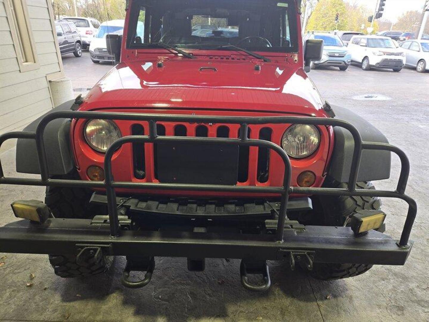 2007 Flame Red Clearcoat Jeep Wrangler Rubicon (1J8GA64197L) with an 3.8L V6 205hp 240ft. lbs. engine, 6 Speed Manual transmission, located at 25355 Eames Street, Channahon, IL, 60410, (815) 467-1807, 41.429108, -88.228432 - This 2007 Jeep Wrangler Rubicon is a top-performing vehicle that boasts a powerful 3.8L V6 205hp 240ft. lbs. engine. With only below 41,000 miles on the odometer, this vehicle has been well-maintained and has an impressive average of less than 3,000 miles per year. The exterior of this Jeep is Flame - Photo#9