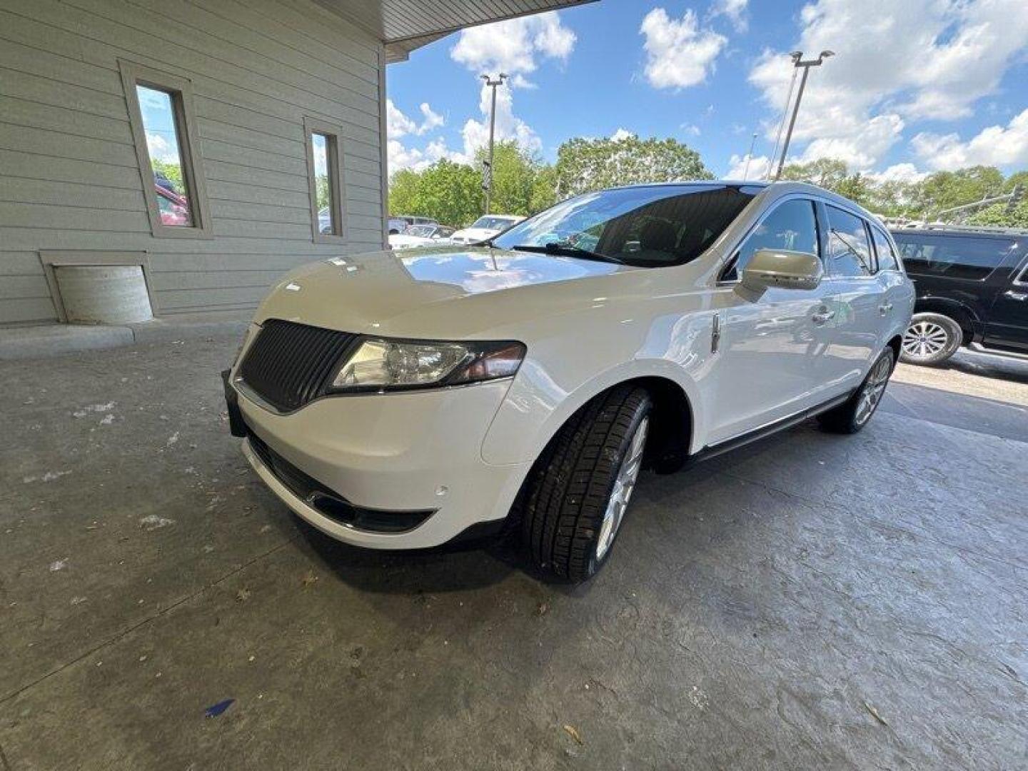 2014 Ingot Silver Metallic Lincoln MKT EcoBoost (2LMHJ5AT6EB) with an EcoBoost 3.5L Twin Turbo V6 365hp 350ft. lbs. engine, Automatic transmission, located at 25355 Eames Street, Channahon, IL, 60410, (815) 467-1807, 41.429108, -88.228432 - Looking for a luxurious and spacious SUV that's both powerful and efficient? Look no further than the 2014 Lincoln MKT Ecoboost! This sleek and stylish SUV is powered by a powerful EcoBoost 3.5L Twin Turbo V6 engine, capable of producing an impressive 365 horsepower and 350 foot-pounds of torque. - Photo#7