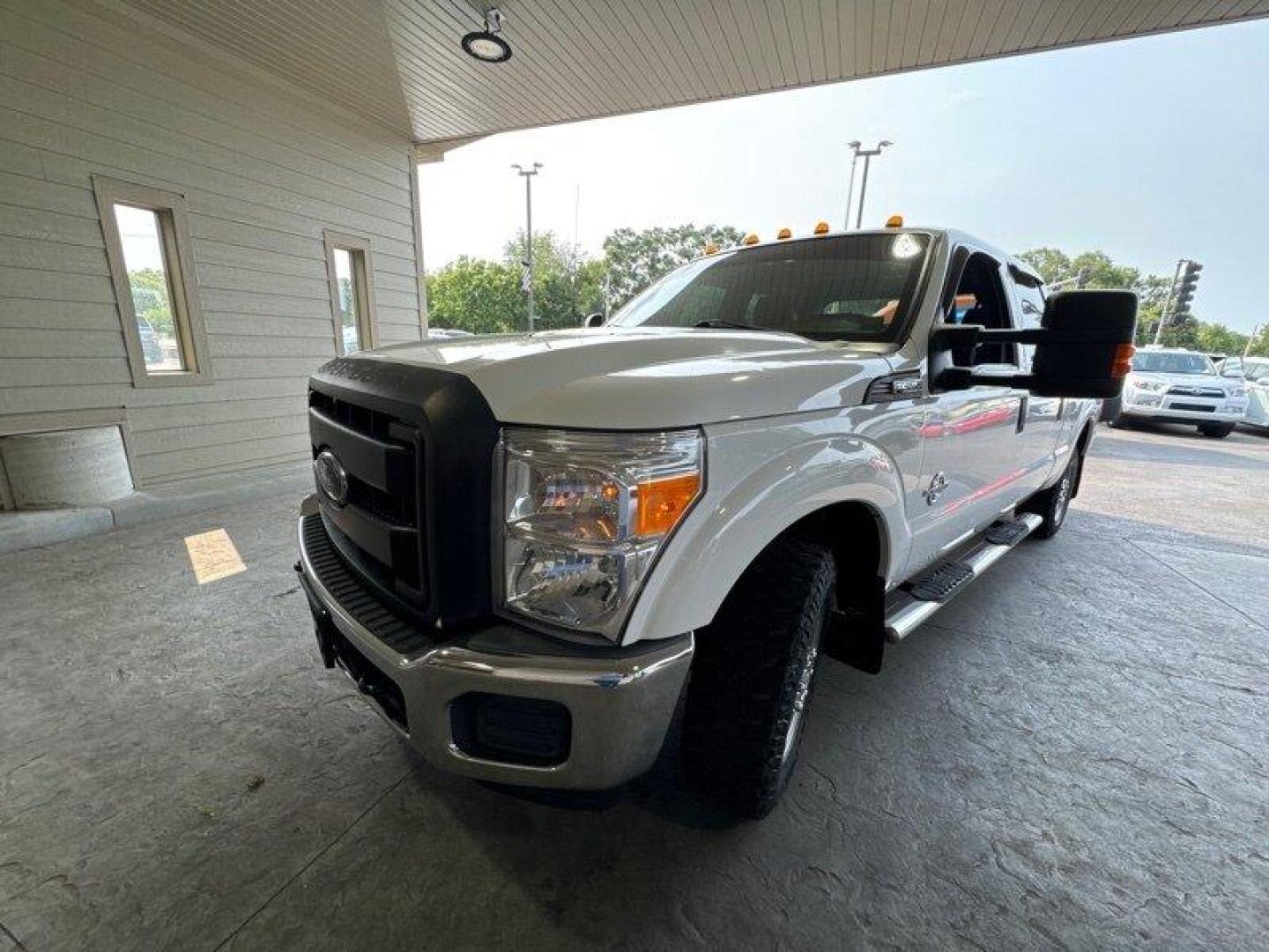 2015 Oxford White Ford F-350 XL (1FT8W3AT1FE) with an Power Stroke 6.7L Biodiesel Turbo V8 440hp 860ft. engine, Automatic transmission, located at 25355 Eames Street, Channahon, IL, 60410, (815) 467-1807, 41.429108, -88.228432 - Looking for a heavy-duty workhorse that can handle anything you throw at it? Look no further than the 2015 Ford F-350 Super Duty XL. With a Power Stroke 6.7L Biodiesel Turbo V8 engine that delivers 440 horsepower and 860 ft. of torque, this truck is built to handle even the toughest jobs. But power - Photo#7