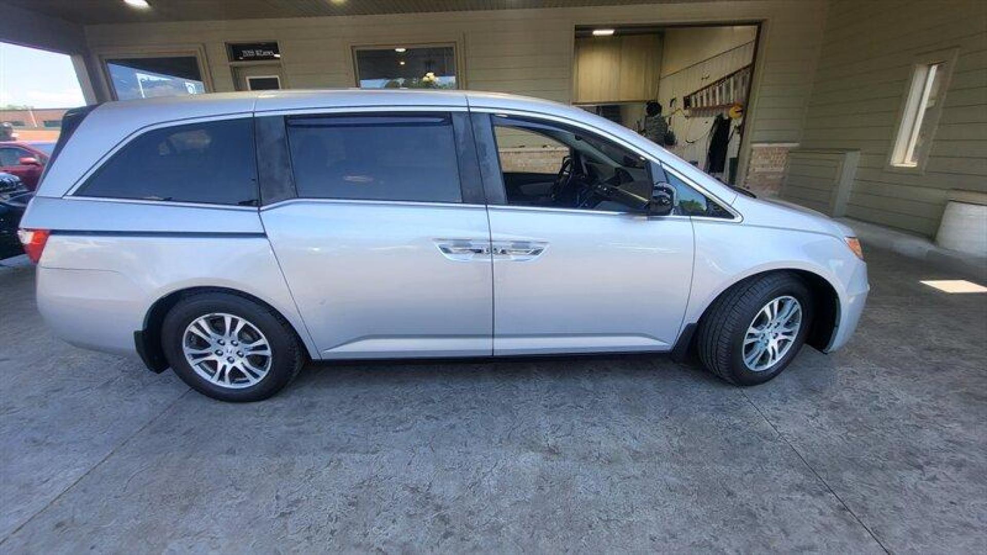 2012 Alabaster Silver Metallic Honda Odyssey EX-L (5FNRL5H68CB) with an 3.5L V6 248hp 250ft. lbs. engine, Automatic transmission, located at 25355 Eames Street, Channahon, IL, 60410, (815) 467-1807, 41.429108, -88.228432 - Ladies and gentlemen, have we got a minivan for you! It's the 2012 Honda Odyssey EX-L, and it's ready to take you and your crew on some seriously epic road trips. Under the hood, this bad boy is powered by a 3.5L V6 engine that cranks out a whopping 248 horsepower and 250 foot-pounds of torque. You - Photo#2