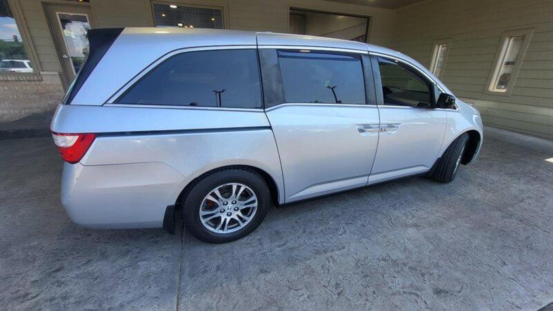 2012 Alabaster Silver Metallic Honda Odyssey EX-L (5FNRL5H68CB) with an 3.5L V6 248hp 250ft. lbs. engine, Automatic transmission, located at 25355 Eames Street, Channahon, IL, 60410, (815) 467-1807, 41.429108, -88.228432 - Ladies and gentlemen, have we got a minivan for you! It's the 2012 Honda Odyssey EX-L, and it's ready to take you and your crew on some seriously epic road trips. Under the hood, this bad boy is powered by a 3.5L V6 engine that cranks out a whopping 248 horsepower and 250 foot-pounds of torque. You - Photo#3