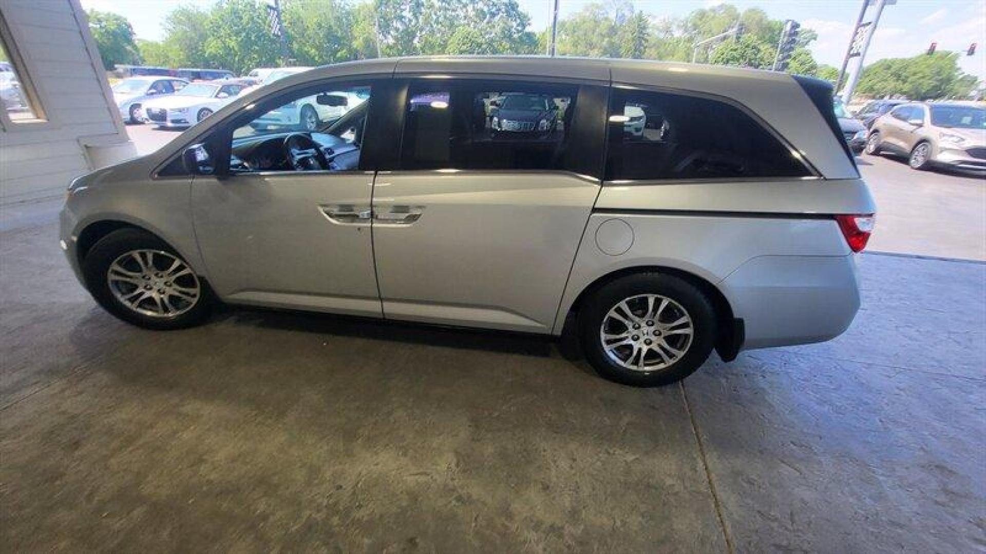 2012 Alabaster Silver Metallic Honda Odyssey EX-L (5FNRL5H68CB) with an 3.5L V6 248hp 250ft. lbs. engine, Automatic transmission, located at 25355 Eames Street, Channahon, IL, 60410, (815) 467-1807, 41.429108, -88.228432 - Ladies and gentlemen, have we got a minivan for you! It's the 2012 Honda Odyssey EX-L, and it's ready to take you and your crew on some seriously epic road trips. Under the hood, this bad boy is powered by a 3.5L V6 engine that cranks out a whopping 248 horsepower and 250 foot-pounds of torque. You - Photo#8