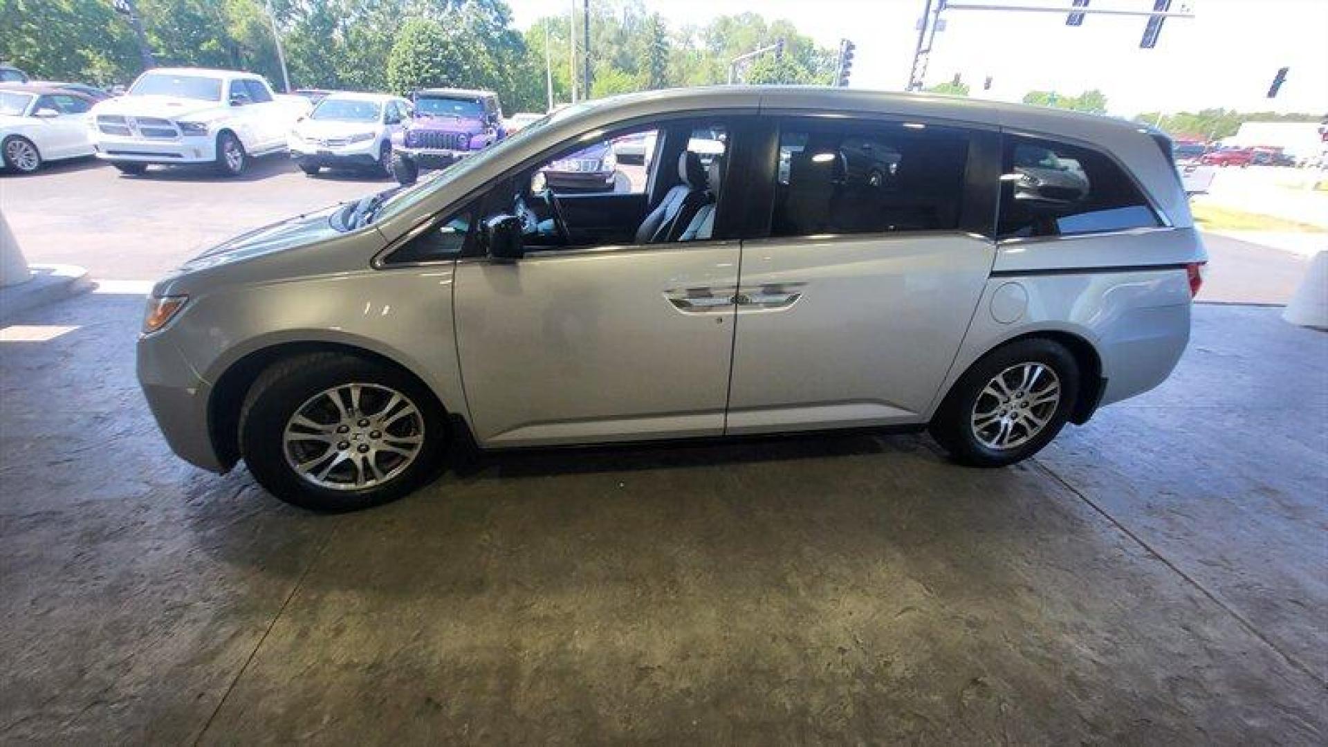 2012 Alabaster Silver Metallic Honda Odyssey EX-L (5FNRL5H68CB) with an 3.5L V6 248hp 250ft. lbs. engine, Automatic transmission, located at 25355 Eames Street, Channahon, IL, 60410, (815) 467-1807, 41.429108, -88.228432 - Ladies and gentlemen, have we got a minivan for you! It's the 2012 Honda Odyssey EX-L, and it's ready to take you and your crew on some seriously epic road trips. Under the hood, this bad boy is powered by a 3.5L V6 engine that cranks out a whopping 248 horsepower and 250 foot-pounds of torque. You - Photo#9