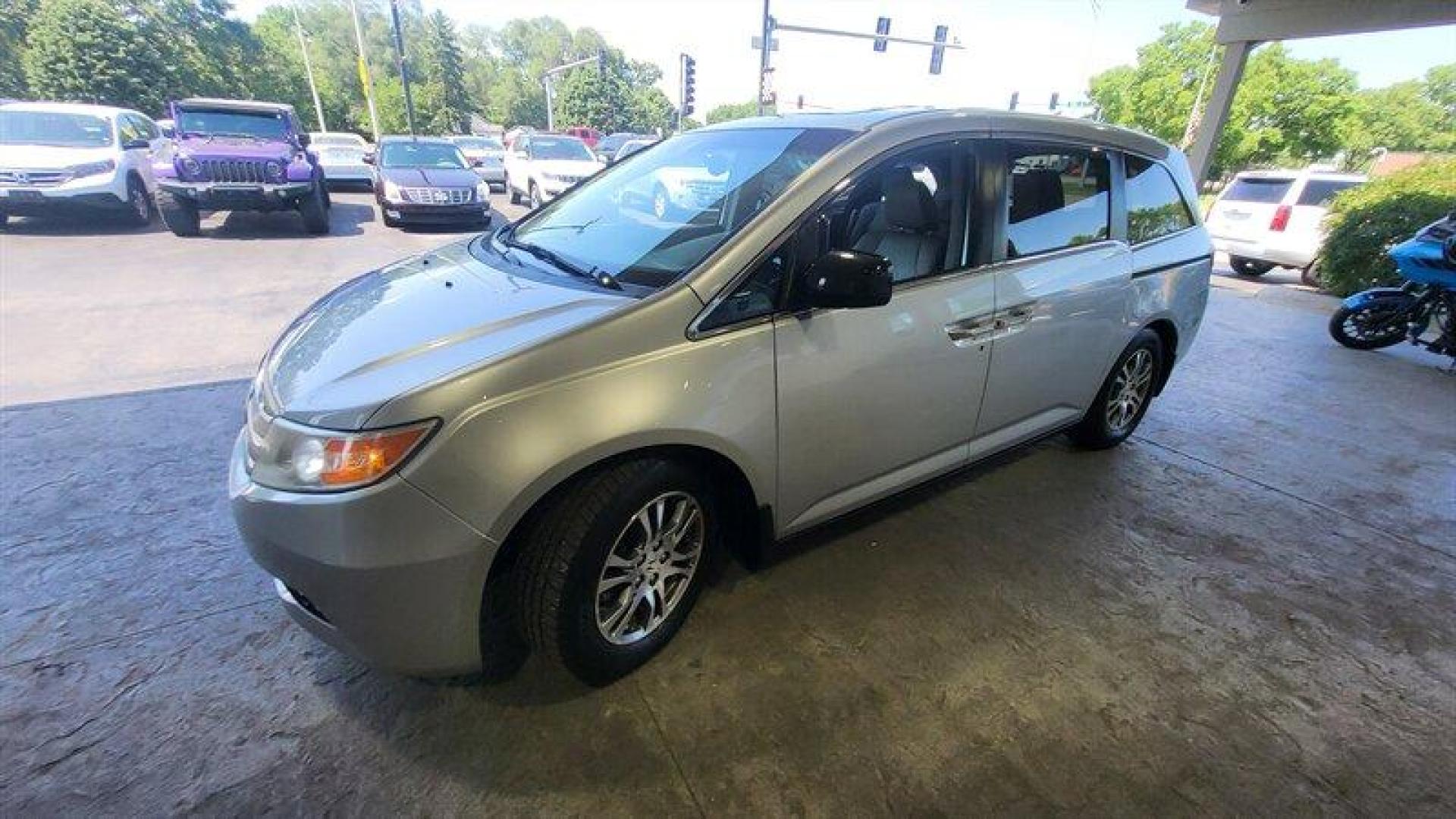 2012 Alabaster Silver Metallic Honda Odyssey EX-L (5FNRL5H68CB) with an 3.5L V6 248hp 250ft. lbs. engine, Automatic transmission, located at 25355 Eames Street, Channahon, IL, 60410, (815) 467-1807, 41.429108, -88.228432 - Ladies and gentlemen, have we got a minivan for you! It's the 2012 Honda Odyssey EX-L, and it's ready to take you and your crew on some seriously epic road trips. Under the hood, this bad boy is powered by a 3.5L V6 engine that cranks out a whopping 248 horsepower and 250 foot-pounds of torque. You - Photo#10