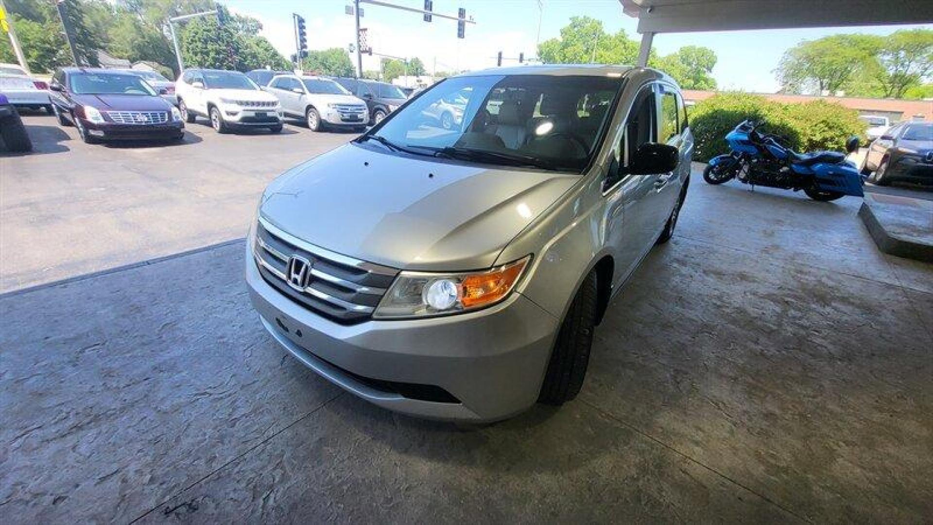 2012 Alabaster Silver Metallic Honda Odyssey EX-L (5FNRL5H68CB) with an 3.5L V6 248hp 250ft. lbs. engine, Automatic transmission, located at 25355 Eames Street, Channahon, IL, 60410, (815) 467-1807, 41.429108, -88.228432 - Ladies and gentlemen, have we got a minivan for you! It's the 2012 Honda Odyssey EX-L, and it's ready to take you and your crew on some seriously epic road trips. Under the hood, this bad boy is powered by a 3.5L V6 engine that cranks out a whopping 248 horsepower and 250 foot-pounds of torque. You - Photo#11