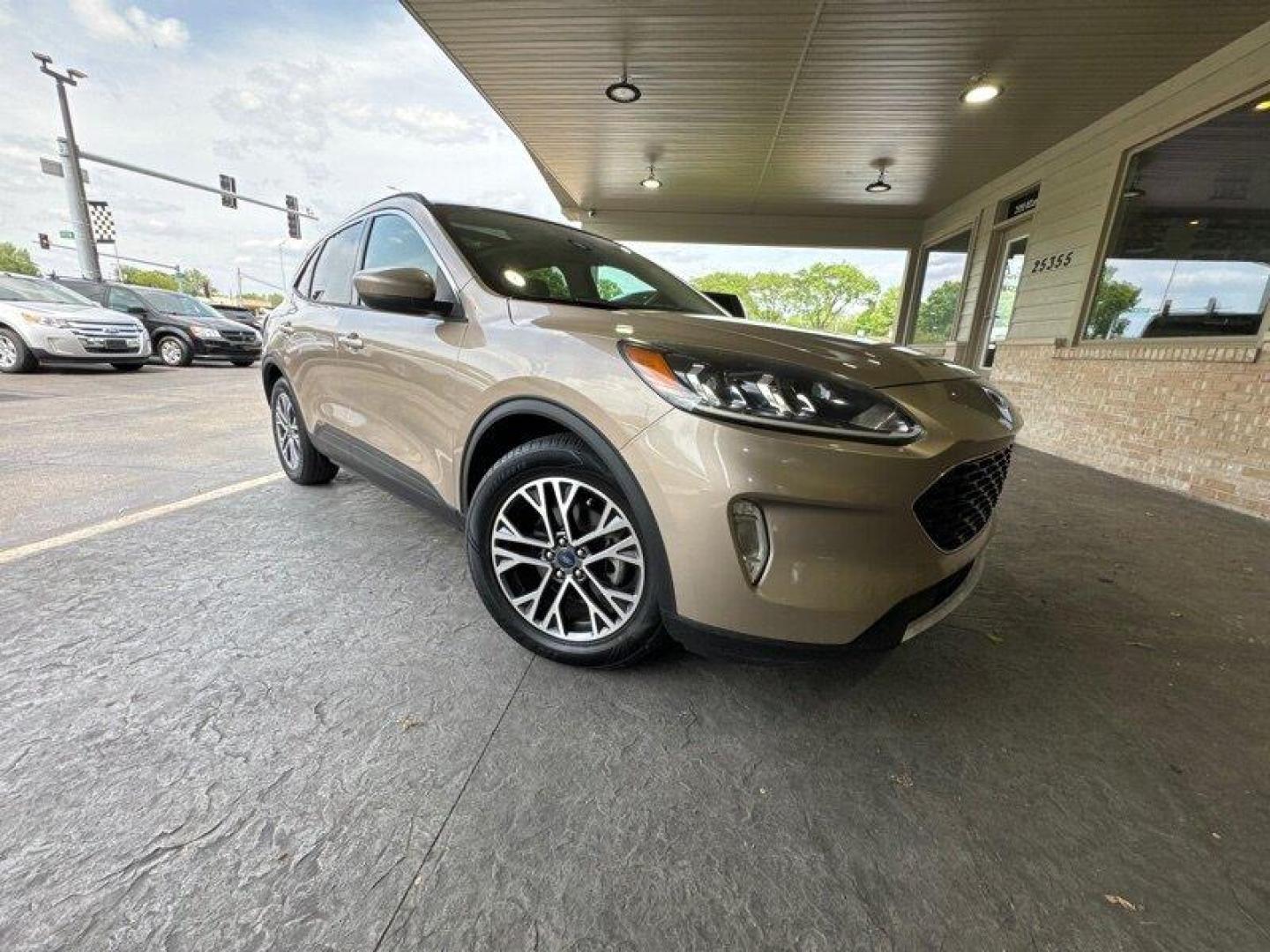 2020 Desert Gold Ford Escape SEL (1FMCU0H6XLU) with an EcoBoost 1.5L Turbo I3 181hp 190ft. lbs. engine, Automatic transmission, located at 25355 Eames Street, Channahon, IL, 60410, (815) 467-1807, 41.429108, -88.228432 - Photo#0