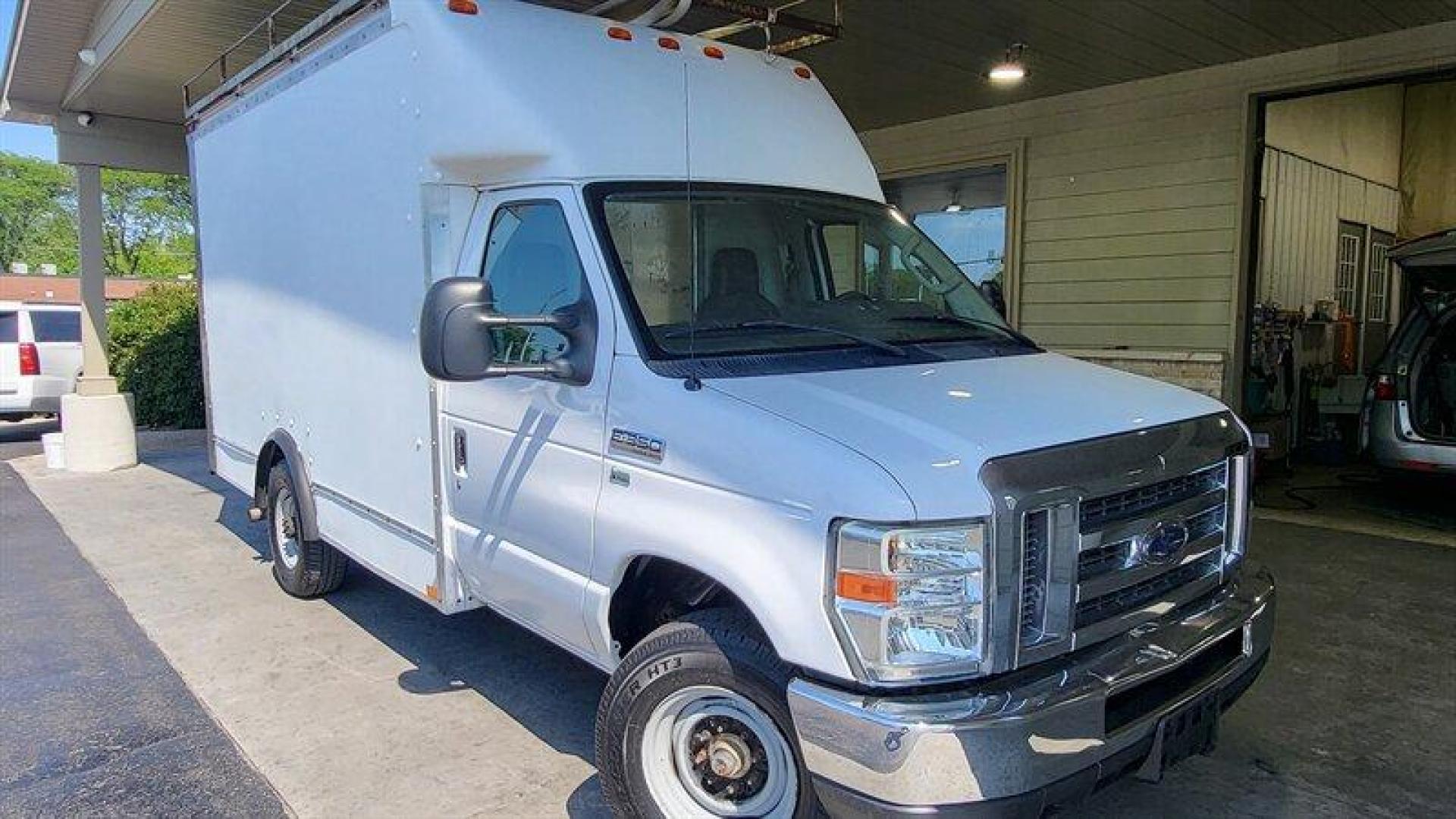 2011 White Ford Base Cutaway (1FDSE3FL4BD) with an Triton 5.4L Flex Fuel V8 255hp 350ft. lbs. engine, Automatic transmission, located at 25355 Eames Street, Channahon, IL, 60410, (815) 467-1807, 41.429108, -88.228432 - ** LOCAL TRADE IN, 12 FOOT BOX, 79 IN WIDE, 78 IN TALL, READY TO WORK FOR YOU. ** Looking for a reliable and spacious vehicle? Check out this 2011 Ford E-350 SD! This versatile van is powered by a Triton 5.4L Flex Fuel V8 engine that delivers 255 horsepower and 350ft. lbs. of torque. The engine runs - Photo#0