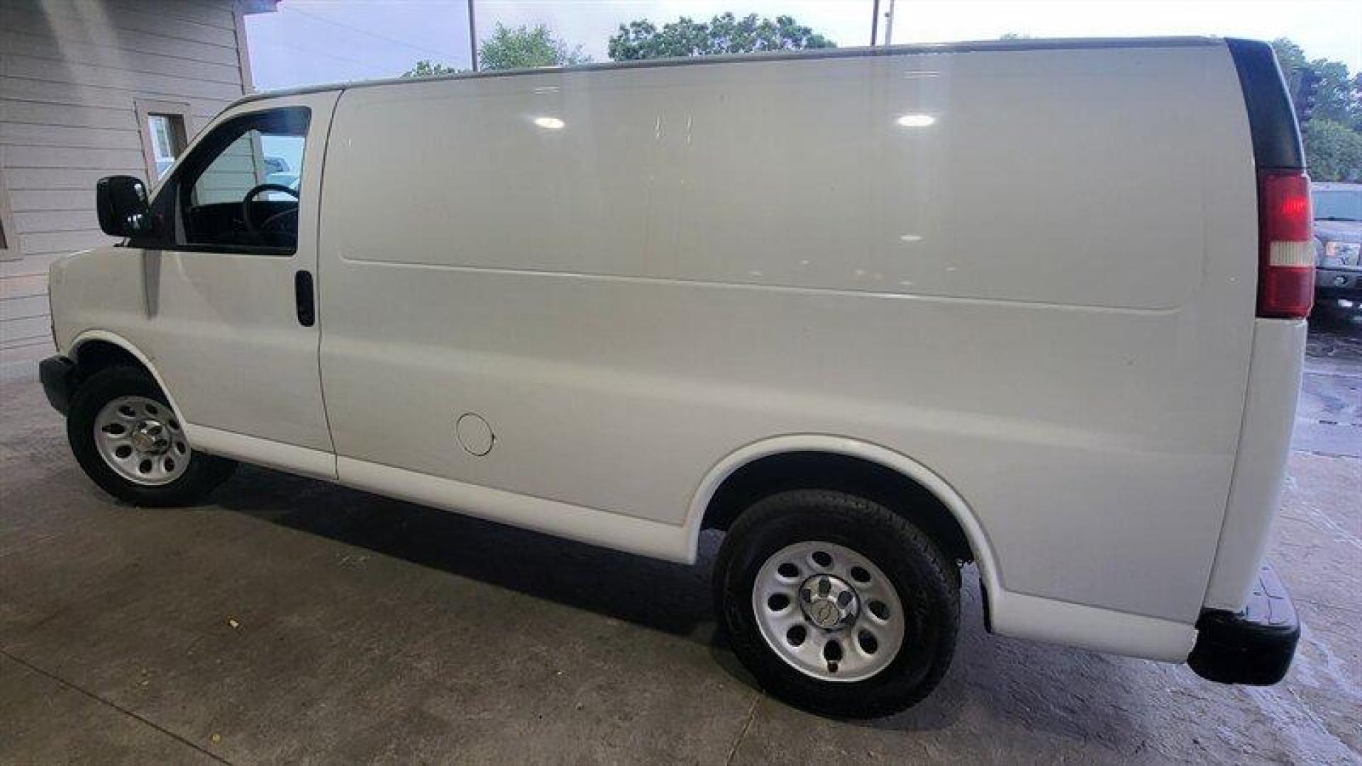 2011 Summit White Chevrolet Express Work Van Cargo (1GCSGAFX2B1) with an Vortec 4.3L V6 195hp 260ft. lbs. engine, Automatic transmission, located at 25355 Eames Street, Channahon, IL, 60410, (815) 467-1807, 41.429108, -88.228432 - Introducing the 2011 Chevrolet Express 1500, a reliable and spacious van that is perfect for both personal and commercial use. Powered by a Vortec 4.3L V6 engine that delivers 195 horsepower and 260ft. lbs. of torque, this van offers a smooth and efficient ride. The exterior of this van is finishe - Photo#9