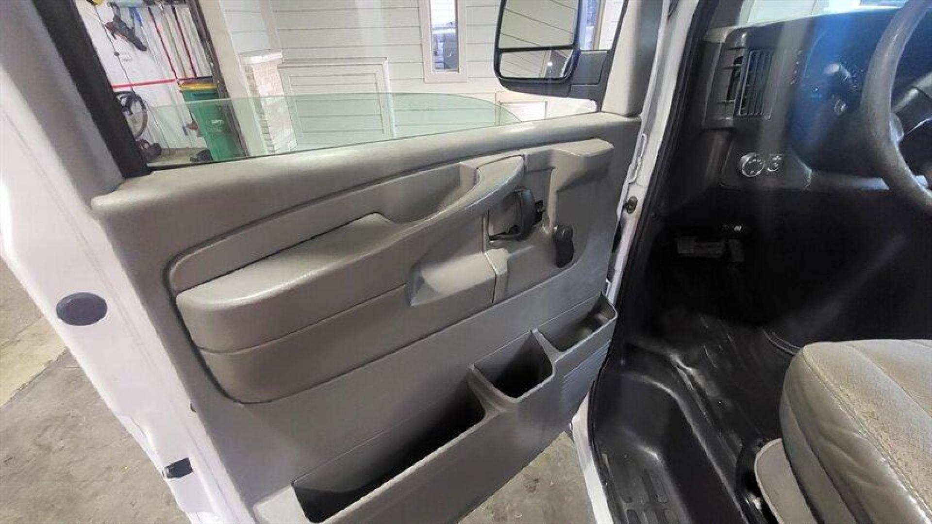 2011 Summit White Chevrolet Express Work Van Cargo (1GCSGAFX2B1) with an Vortec 4.3L V6 195hp 260ft. lbs. engine, Automatic transmission, located at 25355 Eames Street, Channahon, IL, 60410, (815) 467-1807, 41.429108, -88.228432 - Introducing the 2011 Chevrolet Express 1500, a reliable and spacious van that is perfect for both personal and commercial use. Powered by a Vortec 4.3L V6 engine that delivers 195 horsepower and 260ft. lbs. of torque, this van offers a smooth and efficient ride. The exterior of this van is finishe - Photo#14