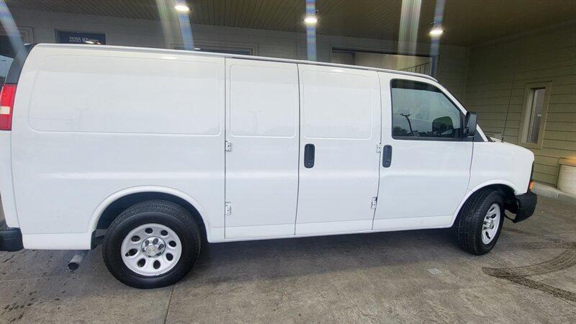 2011 Summit White Chevrolet Express Work Van Cargo (1GCSGAFX2B1) with an Vortec 4.3L V6 195hp 260ft. lbs. engine, Automatic transmission, located at 25355 Eames Street, Channahon, IL, 60410, (815) 467-1807, 41.429108, -88.228432 - Introducing the 2011 Chevrolet Express 1500, a reliable and spacious van that is perfect for both personal and commercial use. Powered by a Vortec 4.3L V6 engine that delivers 195 horsepower and 260ft. lbs. of torque, this van offers a smooth and efficient ride. The exterior of this van is finishe - Photo#3