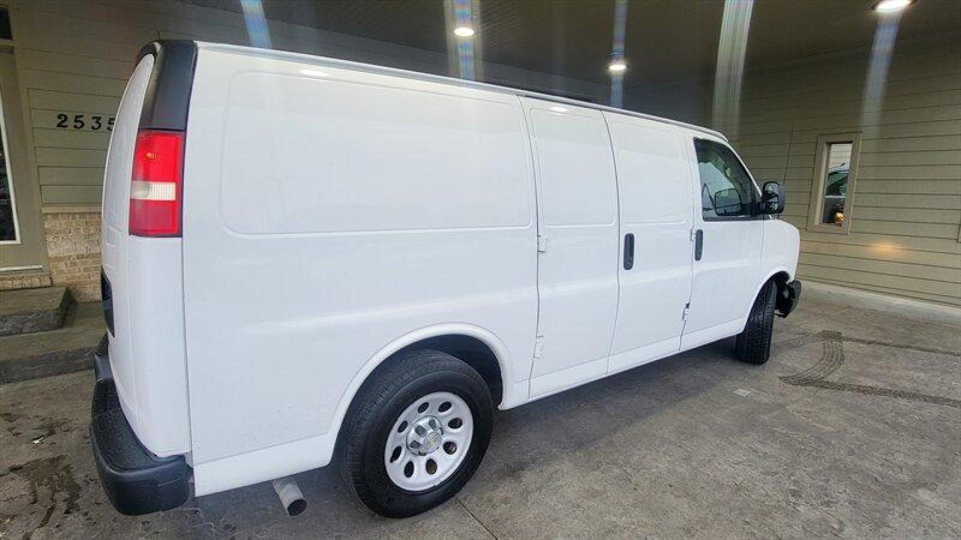 2011 Summit White Chevrolet Express Work Van Cargo (1GCSGAFX2B1) with an Vortec 4.3L V6 195hp 260ft. lbs. engine, Automatic transmission, located at 25355 Eames Street, Channahon, IL, 60410, (815) 467-1807, 41.429108, -88.228432 - Introducing the 2011 Chevrolet Express 1500, a reliable and spacious van that is perfect for both personal and commercial use. Powered by a Vortec 4.3L V6 engine that delivers 195 horsepower and 260ft. lbs. of torque, this van offers a smooth and efficient ride. The exterior of this van is finishe - Photo#4