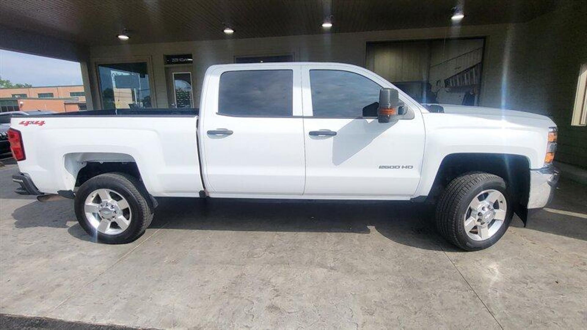 2019 Summit White Chevrolet Silverado 2500 Work Truck (1GC1KREG4KF) with an Vortec 6.0L Flex Fuel V8 360hp 380ft. lbs. engine, Automatic transmission, located at 25355 Eames Street, Channahon, IL, 60410, (815) 467-1807, 41.429108, -88.228432 - Introducing the 2019 Chevrolet Silverado 2500 Work Truck, the ultimate workhorse that's ready to tackle any job with ease! Powered by a Vortec 6.0L Flex Fuel V8 engine that packs a whopping 360 horsepower and 380 foot-pounds of torque, this bad boy is built to handle anything you throw its way. But - Photo#1