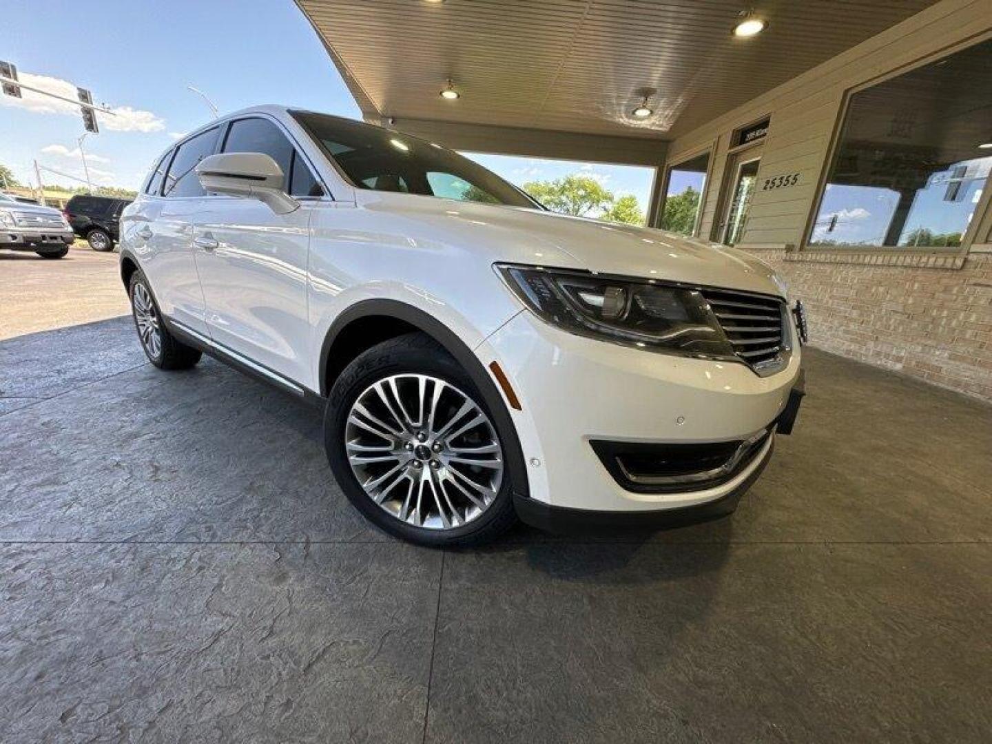 2016 White Platinum Metallic Tri-Coat Lincoln MKX Reserve (2LMTJ6LR2GB) with an 3.7L V6 300hp 280ft. lbs. engine, Automatic transmission, located at 25355 Eames Street, Channahon, IL, 60410, (815) 467-1807, 41.429108, -88.228432 - Well, well, well. Feast your eyes on this luxurious 2016 Lincoln MKX Reserve. This baby is powered by a 3.7L V6 engine that pumps out an impressive 300 horsepower and 280ft. lbs. of torque. You'll feel like you're flying on the highway with this bad boy. Let's talk about the factory default feature - Photo#0