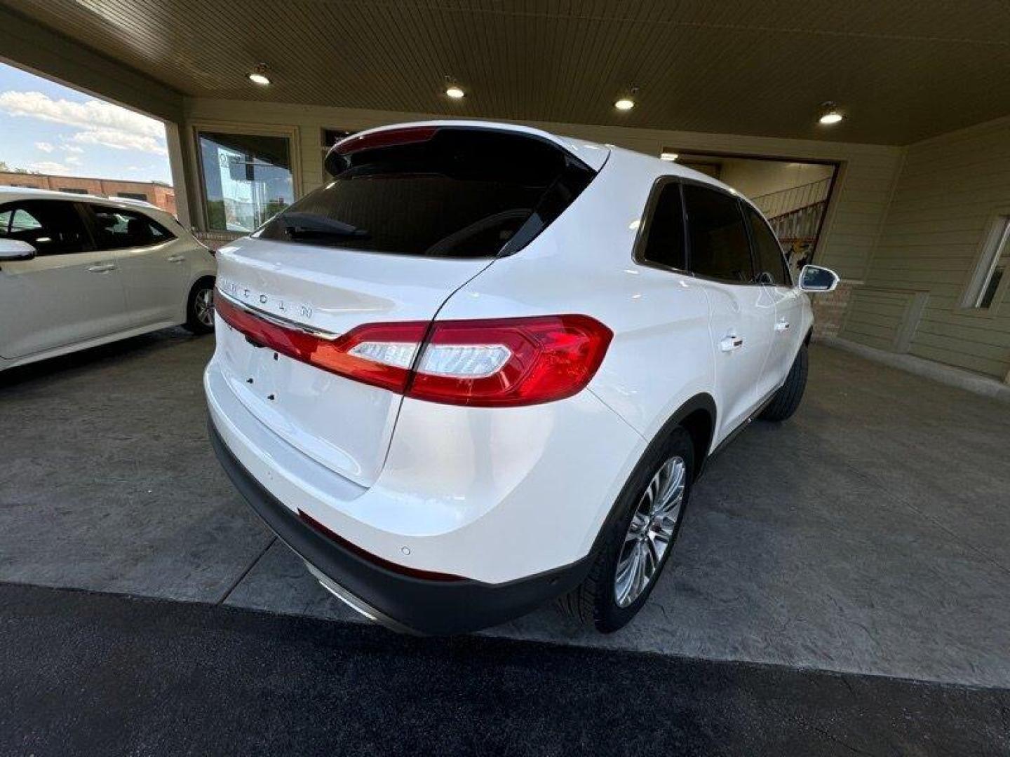 2016 White Platinum Metallic Tri-Coat Lincoln MKX Reserve (2LMTJ6LR2GB) with an 3.7L V6 300hp 280ft. lbs. engine, Automatic transmission, located at 25355 Eames Street, Channahon, IL, 60410, (815) 467-1807, 41.429108, -88.228432 - Well, well, well. Feast your eyes on this luxurious 2016 Lincoln MKX Reserve. This baby is powered by a 3.7L V6 engine that pumps out an impressive 300 horsepower and 280ft. lbs. of torque. You'll feel like you're flying on the highway with this bad boy. Let's talk about the factory default feature - Photo#3