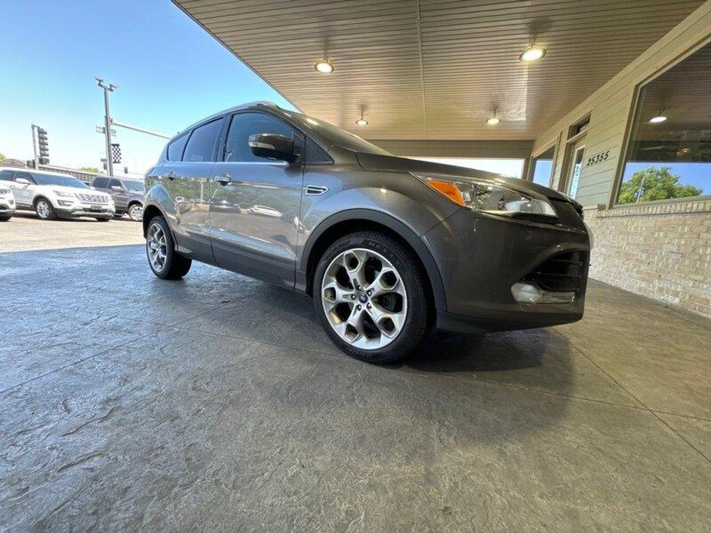 2014 Sterling Gray Metallic Ford Escape Titanium (1FMCU0JX0EU) with an EcoBoost 1.6L Turbo I4 178hp 184ft. lbs. engine, Automatic transmission, located at 25355 Eames Street, Channahon, IL, 60410, (815) 467-1807, 41.429108, -88.228432 - Photo#0