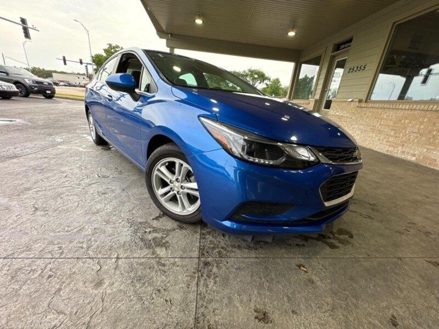 2016 Blue Ray Metallic Chevrolet Cruze LT (1G1BE5SM6G7) with an 1.4L Turbo I4 153hp 177ft. lbs. engine, Automatic transmission, located at 25355 Eames Street, Channahon, IL, 60410, (815) 467-1807, 41.429108, -88.228432 - Looking for a reliable and stylish car that won't break the bank? Look no further than the 2016 Chevrolet Cruze LT Auto! This Blue Ray Metallic beauty is powered by a 1.4L Turbo I4 engine that boasts an impressive 153 horsepower and 177ft. lbs. of torque. This vehicle comes with a range of factory - Photo#0