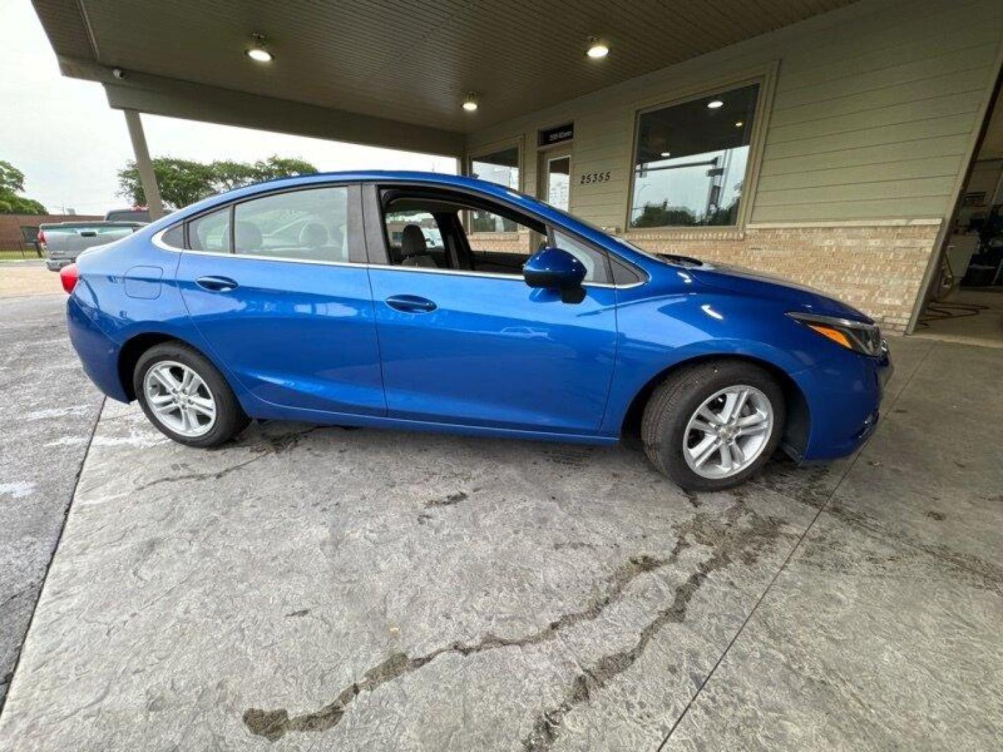 2016 Blue Ray Metallic Chevrolet Cruze LT (1G1BE5SM6G7) with an 1.4L Turbo I4 153hp 177ft. lbs. engine, Automatic transmission, located at 25355 Eames Street, Channahon, IL, 60410, (815) 467-1807, 41.429108, -88.228432 - Looking for a reliable and stylish car that won't break the bank? Look no further than the 2016 Chevrolet Cruze LT Auto! This Blue Ray Metallic beauty is powered by a 1.4L Turbo I4 engine that boasts an impressive 153 horsepower and 177ft. lbs. of torque. This vehicle comes with a range of factory - Photo#1