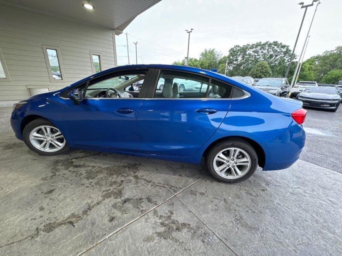 2016 Blue Ray Metallic Chevrolet Cruze LT (1G1BE5SM6G7) with an 1.4L Turbo I4 153hp 177ft. lbs. engine, Automatic transmission, located at 25355 Eames Street, Channahon, IL, 60410, (815) 467-1807, 41.429108, -88.228432 - Looking for a reliable and stylish car that won't break the bank? Look no further than the 2016 Chevrolet Cruze LT Auto! This Blue Ray Metallic beauty is powered by a 1.4L Turbo I4 engine that boasts an impressive 153 horsepower and 177ft. lbs. of torque. This vehicle comes with a range of factory - Photo#5