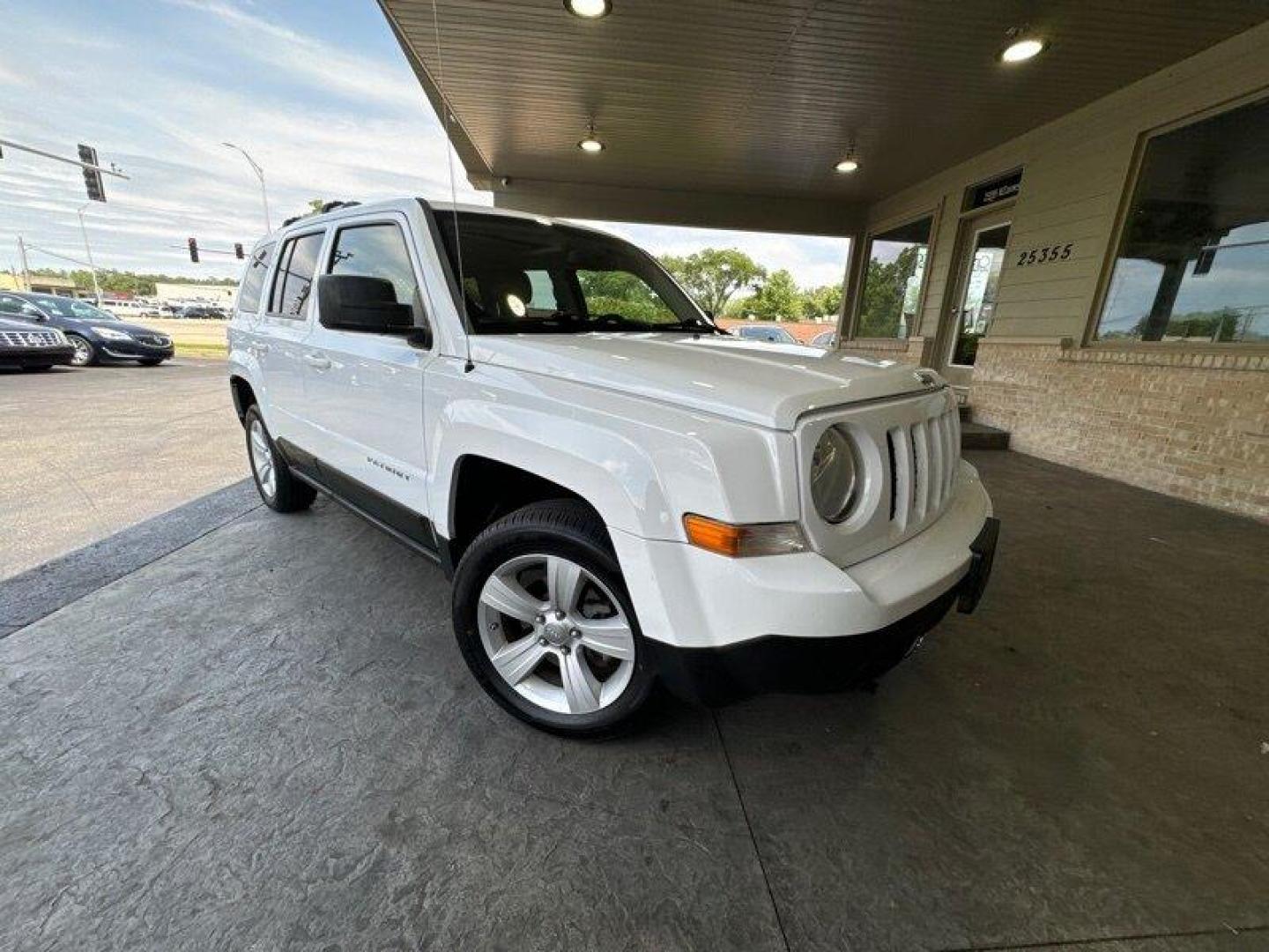 2011 Bright White Clear Coat Jeep Patriot Latitude X (1J4NF4GB2BD) with an 2.4L I4 172hp 165ft. lbs. engine, Automatic transmission, located at 25355 Eames Street, Channahon, IL, 60410, (815) 467-1807, 41.429108, -88.228432 - Looking for a ride that will take you anywhere and everywhere in style? Look no further than the 2011 Jeep Patriot Latitude X! This baby is powered by a 2.4L I4 engine that cranks out a respectable 172 horsepower and 165 foot-pounds of torque. But let's talk about the factory default features, sha - Photo#0