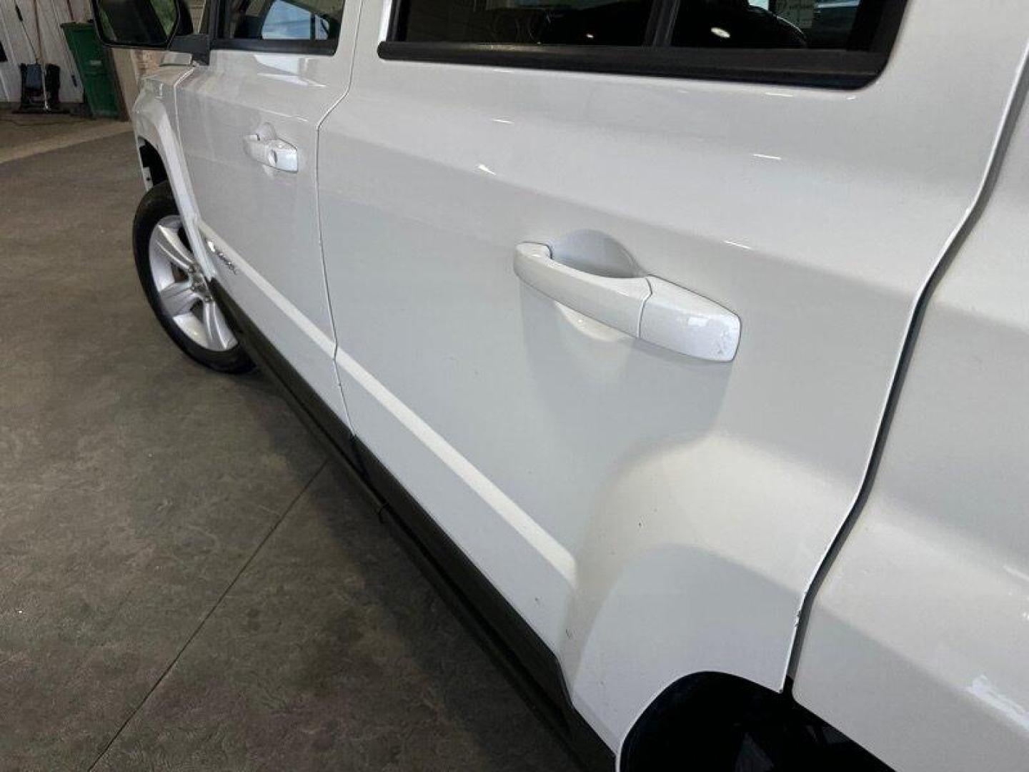 2011 Bright White Clear Coat Jeep Patriot Latitude X (1J4NF4GB2BD) with an 2.4L I4 172hp 165ft. lbs. engine, Automatic transmission, located at 25355 Eames Street, Channahon, IL, 60410, (815) 467-1807, 41.429108, -88.228432 - Looking for a ride that will take you anywhere and everywhere in style? Look no further than the 2011 Jeep Patriot Latitude X! This baby is powered by a 2.4L I4 engine that cranks out a respectable 172 horsepower and 165 foot-pounds of torque. But let's talk about the factory default features, sha - Photo#9