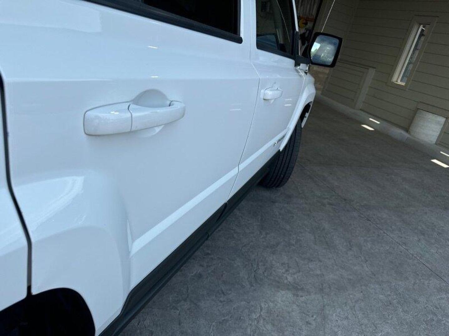 2011 Bright White Clear Coat Jeep Patriot Latitude X (1J4NF4GB2BD) with an 2.4L I4 172hp 165ft. lbs. engine, Automatic transmission, located at 25355 Eames Street, Channahon, IL, 60410, (815) 467-1807, 41.429108, -88.228432 - Looking for a ride that will take you anywhere and everywhere in style? Look no further than the 2011 Jeep Patriot Latitude X! This baby is powered by a 2.4L I4 engine that cranks out a respectable 172 horsepower and 165 foot-pounds of torque. But let's talk about the factory default features, sha - Photo#10