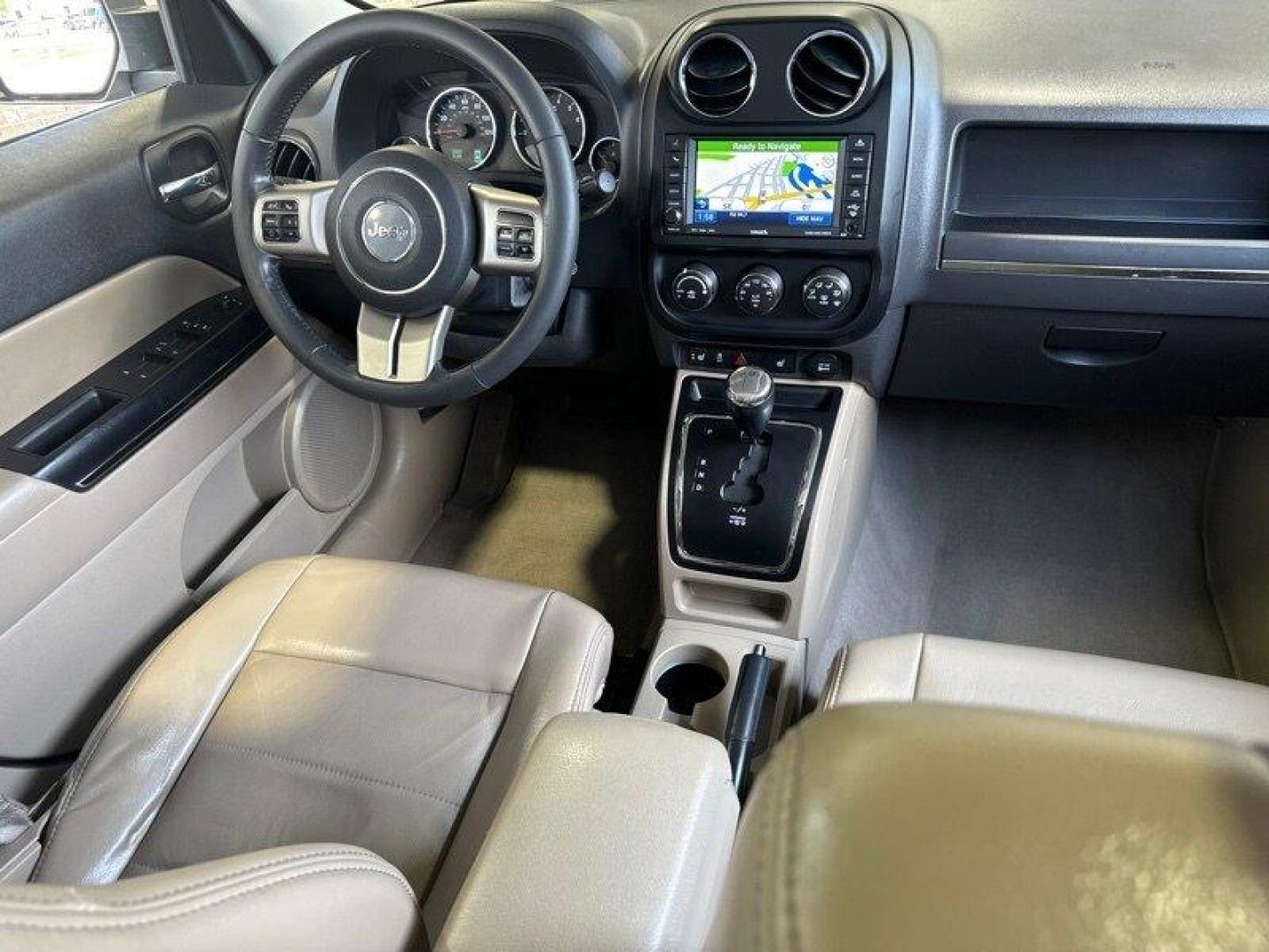 2011 Bright White Clear Coat Jeep Patriot Latitude X (1J4NF4GB2BD) with an 2.4L I4 172hp 165ft. lbs. engine, Automatic transmission, located at 25355 Eames Street, Channahon, IL, 60410, (815) 467-1807, 41.429108, -88.228432 - Looking for a ride that will take you anywhere and everywhere in style? Look no further than the 2011 Jeep Patriot Latitude X! This baby is powered by a 2.4L I4 engine that cranks out a respectable 172 horsepower and 165 foot-pounds of torque. But let's talk about the factory default features, sha - Photo#18