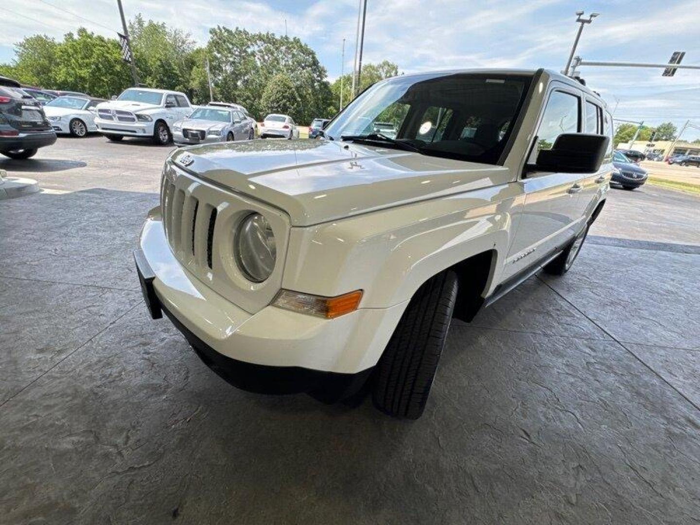 2011 Bright White Clear Coat Jeep Patriot Latitude X (1J4NF4GB2BD) with an 2.4L I4 172hp 165ft. lbs. engine, Automatic transmission, located at 25355 Eames Street, Channahon, IL, 60410, (815) 467-1807, 41.429108, -88.228432 - Looking for a ride that will take you anywhere and everywhere in style? Look no further than the 2011 Jeep Patriot Latitude X! This baby is powered by a 2.4L I4 engine that cranks out a respectable 172 horsepower and 165 foot-pounds of torque. But let's talk about the factory default features, sha - Photo#7