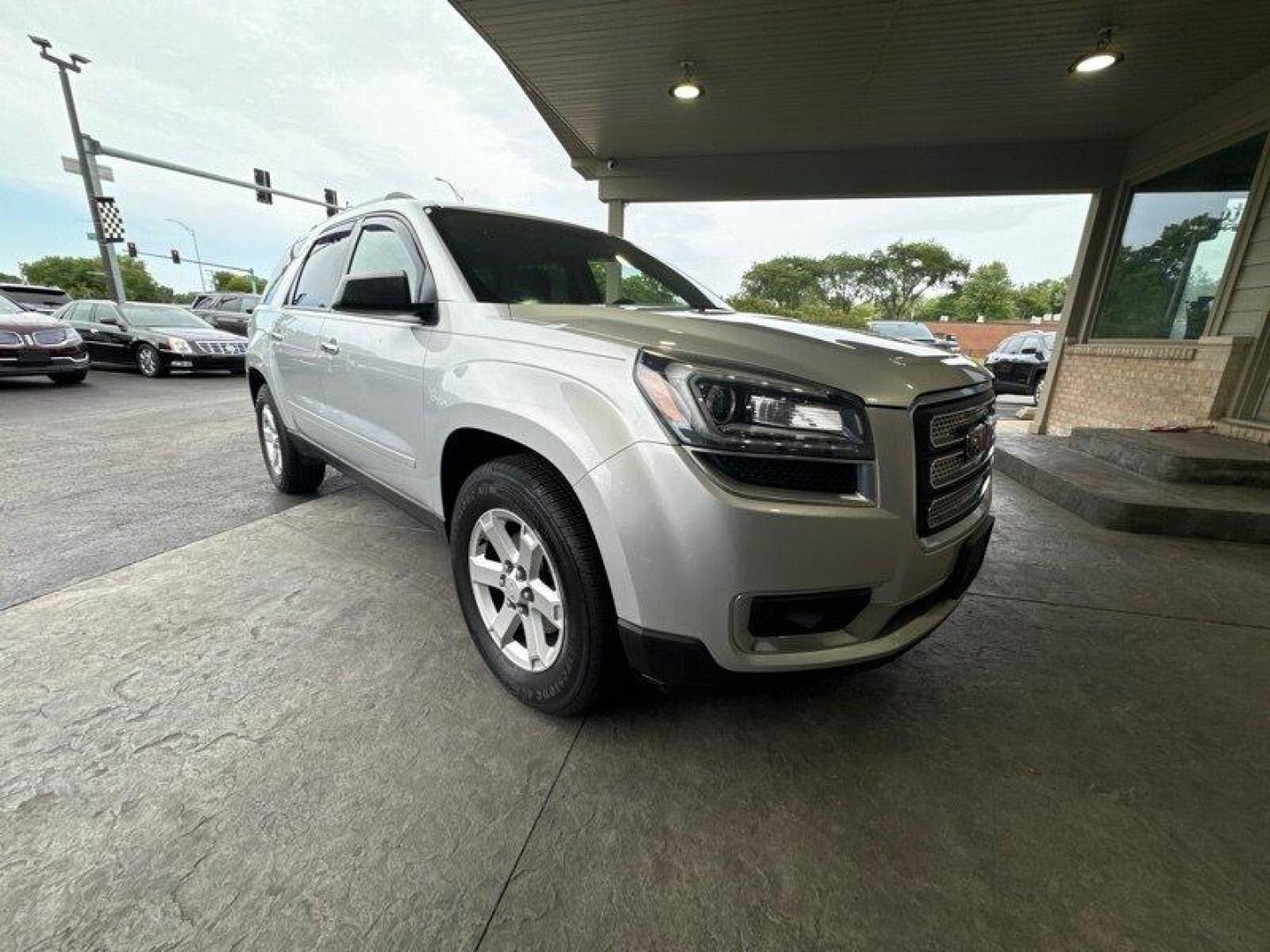 2015 Quicksilver Metallic GMC Acadia SLE-2 (1GKKRPKD9FJ) with an 3.6L V6 281hp 266ft. lbs. engine, Automatic transmission, located at 25355 Eames Street, Channahon, IL, 60410, (815) 467-1807, 41.429108, -88.228432 - Ladies and gentlemen, feast your eyes on the 2015 GMC Acadia SLE-2! This baby is powered by a 3.6L V6 engine that can pump out a whopping 281 horsepower and 266 ft. lbs. of torque. If you don't know what that means, just know that it's fast and powerful. Now, let's talk about the factory default f - Photo#0