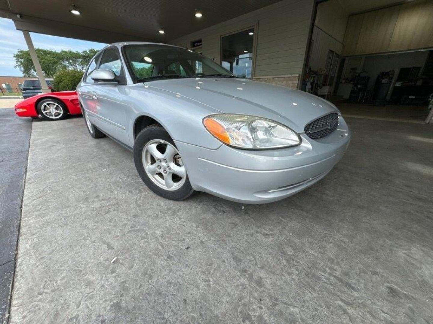 2003 Silver Frost Clearcoat Metallic Ford Taurus SES (1FAFP55U83A) with an 3.0L NA V6 overhead valves (OHV) 12V engine, Automatic transmission, located at 25355 Eames Street, Channahon, IL, 60410, (815) 467-1807, 41.429108, -88.228432 - Looking for a ride that's both stylish and practical? Look no further than this 2003 Ford Taurus SES! With its sleek design and powerful 3.0L NA V6 overhead valves (OHV) 12V engine, this baby is sure to turn heads. And with less than 59,000 miles on the odometer, you'll be cruising in style for year - Photo#0