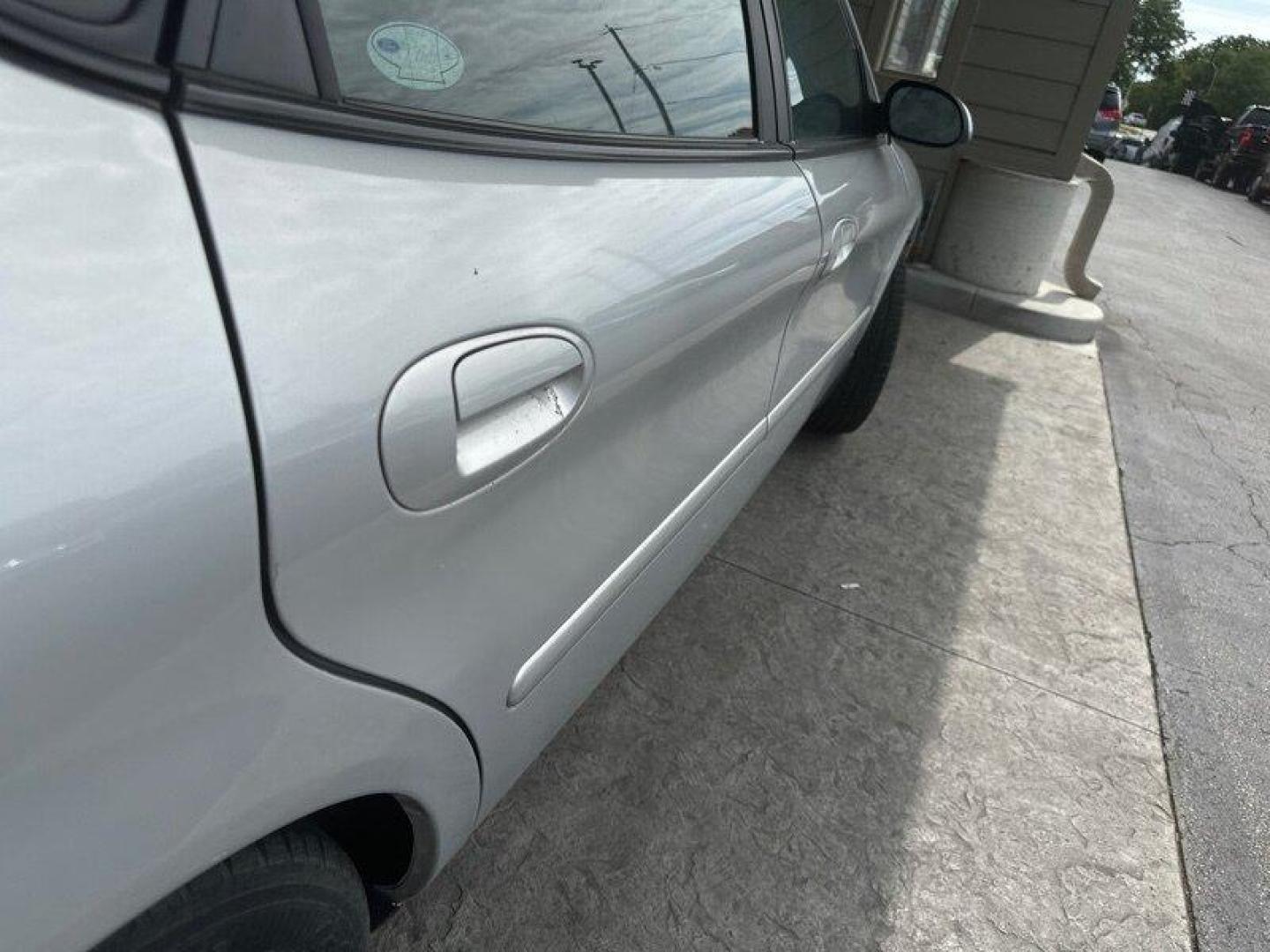 2003 Silver Frost Clearcoat Metallic Ford Taurus SES (1FAFP55U83A) with an 3.0L NA V6 overhead valves (OHV) 12V engine, Automatic transmission, located at 25355 Eames Street, Channahon, IL, 60410, (815) 467-1807, 41.429108, -88.228432 - Looking for a ride that's both stylish and practical? Look no further than this 2003 Ford Taurus SES! With its sleek design and powerful 3.0L NA V6 overhead valves (OHV) 12V engine, this baby is sure to turn heads. And with less than 59,000 miles on the odometer, you'll be cruising in style for year - Photo#10